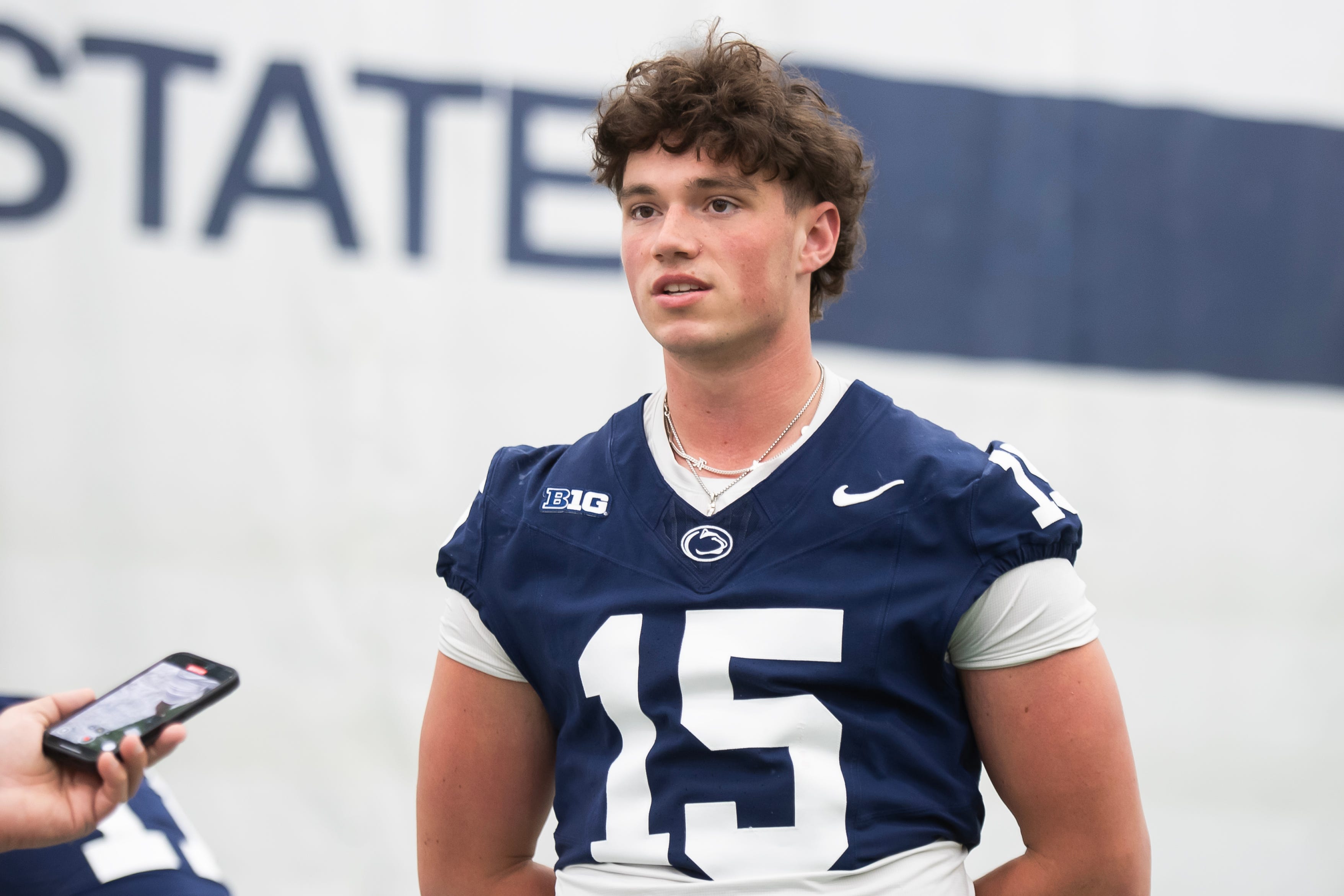 Penn State quarterback Drew Allar talks with reporters during football media day in Holuba Hall on Saturday, August 2, 2025, in State College.