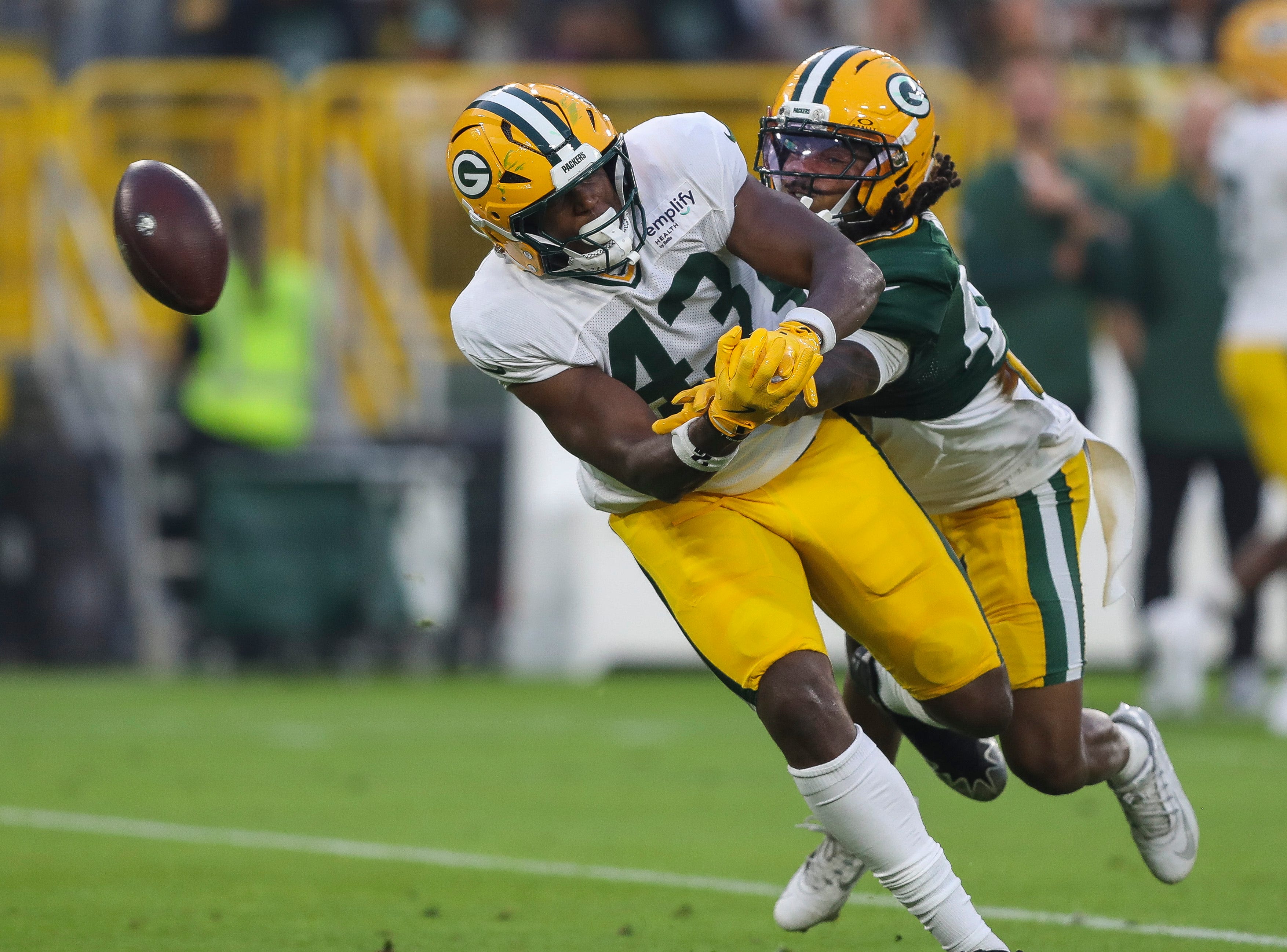 Green Bay Packers safety Omar Brown (right) breaks up a pass intended for tight end Johnny Lumpkin (43) during Family Night on Saturday, August 2, 2025, at Lambeau Field in Green Bay, Wis.