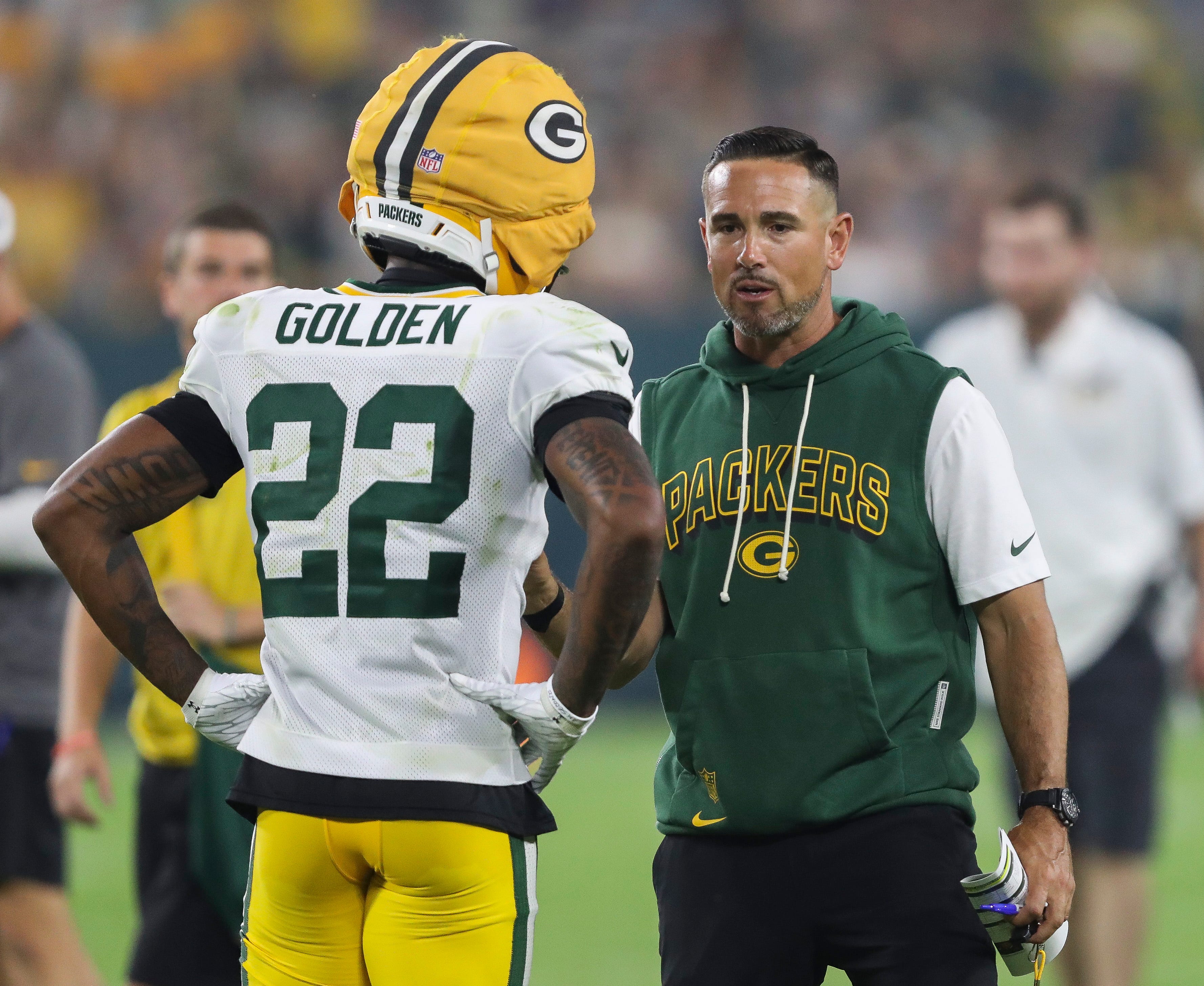 Green Bay Packers head coach Matt LaFleur talks to wide receiver Matthew Golden (22) during Family Night on Saturday, August 2, 2025, at Lambeau Field in Green Bay, Wis.