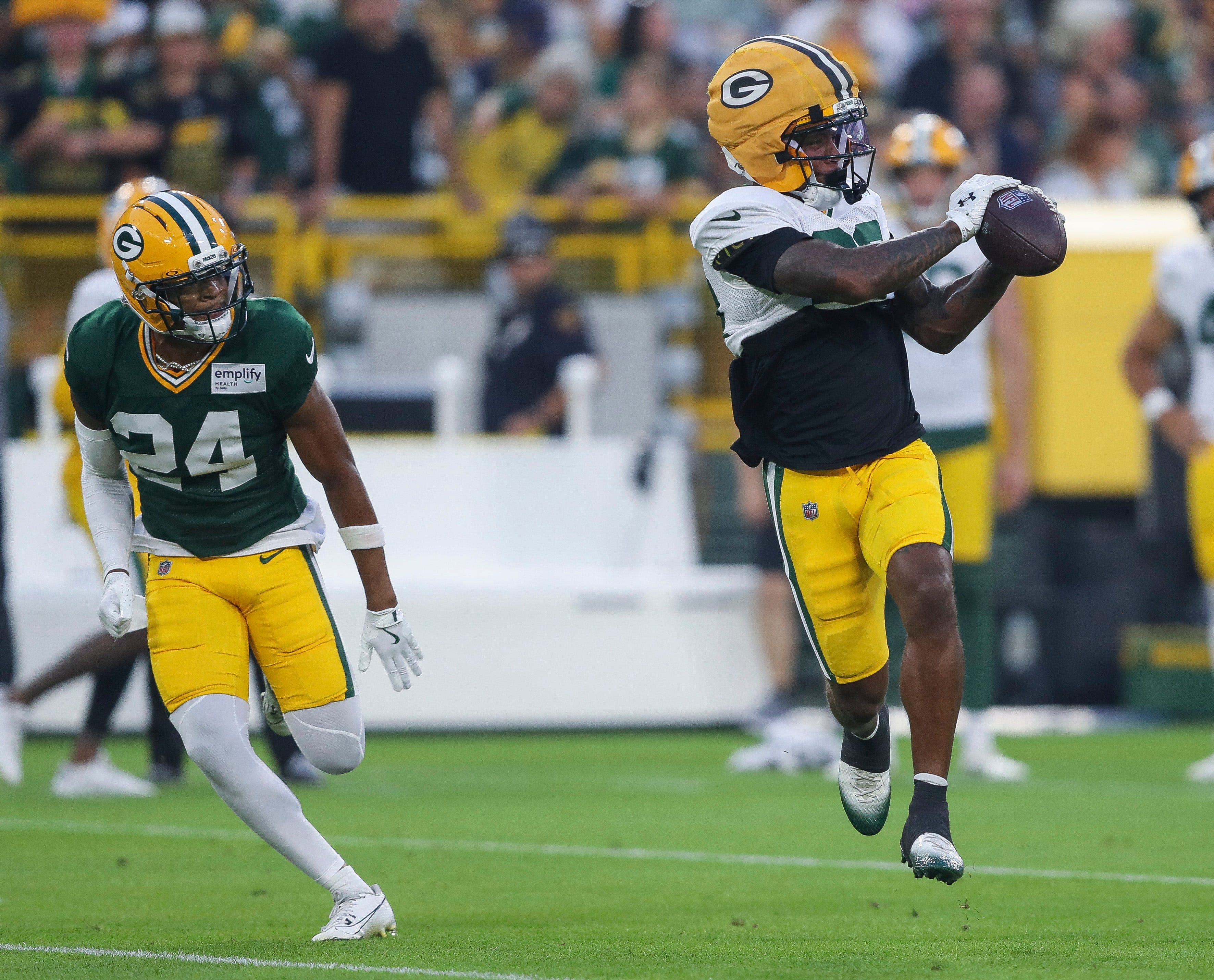 Green Bay Packers wide receiver Matthew Golden (22) catches a pass during Family Night on Saturday, August 2, 2025, at Lambeau Field in Green Bay, Wis.