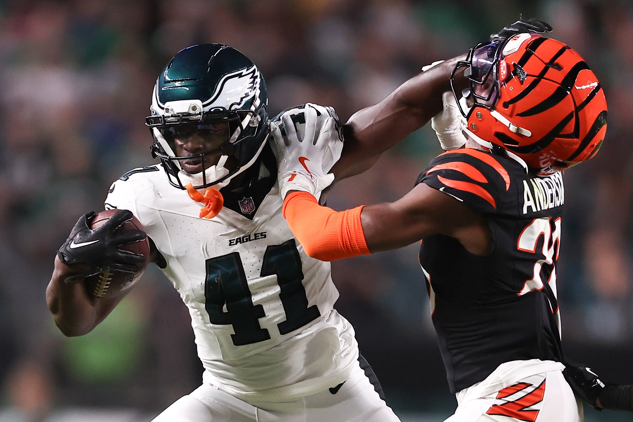 Philadelphia Eagles wide receiver Darius Cooper (41) runs with the ball against Cincinnati Bengals safety Tycen Anderson (26) after a catch during the second quarter at Lincoln Financial Field. Bill Streicher-Imagn Images