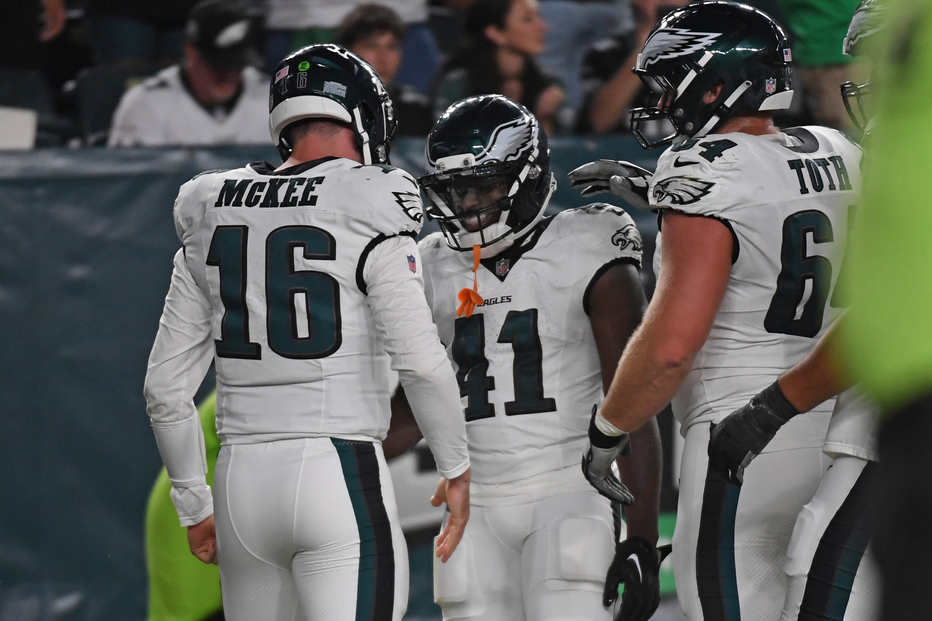 Philadelphia Eagles wide receiver Darius Cooper (41) and quarterback Tanner McKee (16) celebrates a touchdown against the Cincinnati Bengals during the second quarter at Lincoln Financial Field.