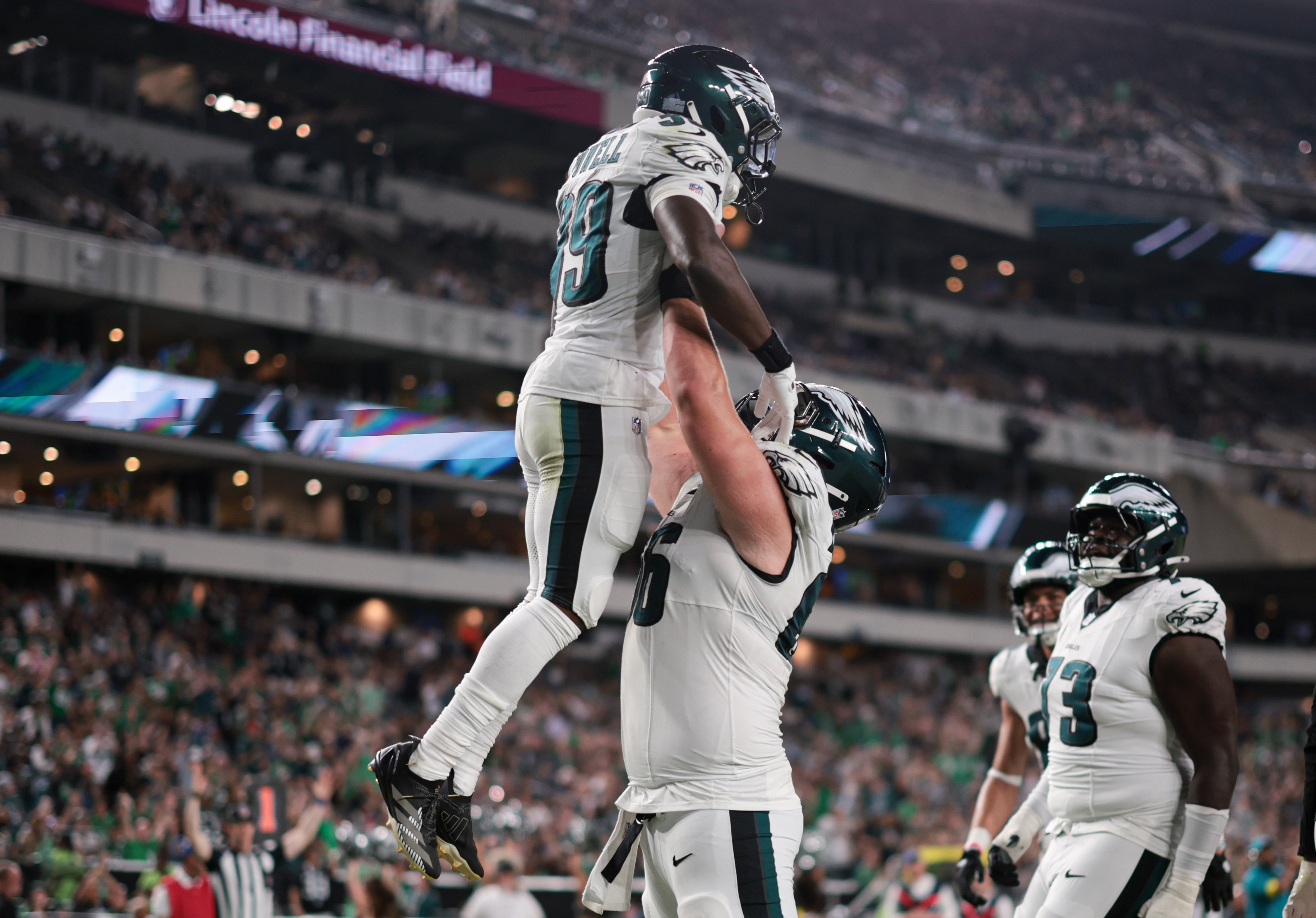 Philadelphia Eagles center Drew Kendall (66) and running back ShunDerrick Powell (39) celebrate after his touchdown against the Cincinnati Bengals during the third quarter at Lincoln Financial Field.