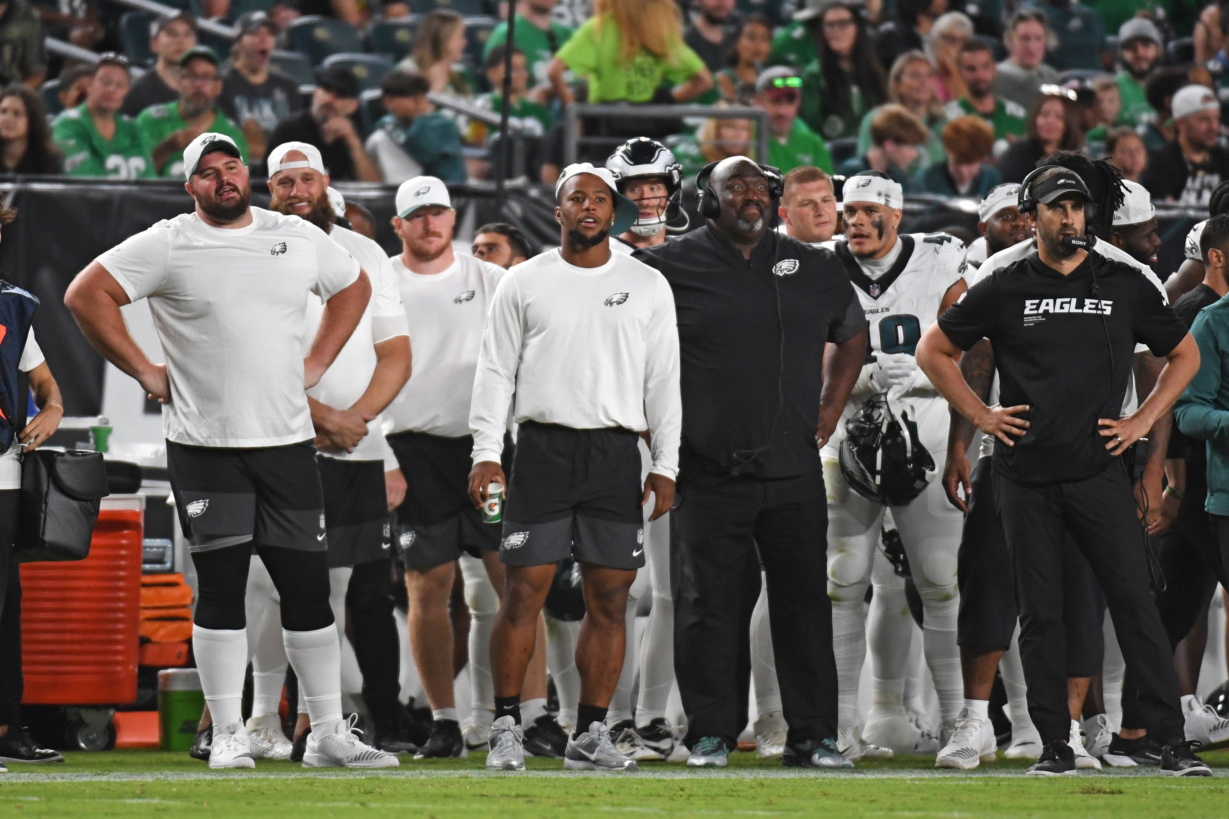 Philadelphia Eagles guard Landon Dickerson (69), running back Saquon Barkley (26) and head coach Nick Sirianni on the sidelines against the Cincinnati Bengals during the second quarter at Lincoln Fina... Eric Hartline-Imagn Images