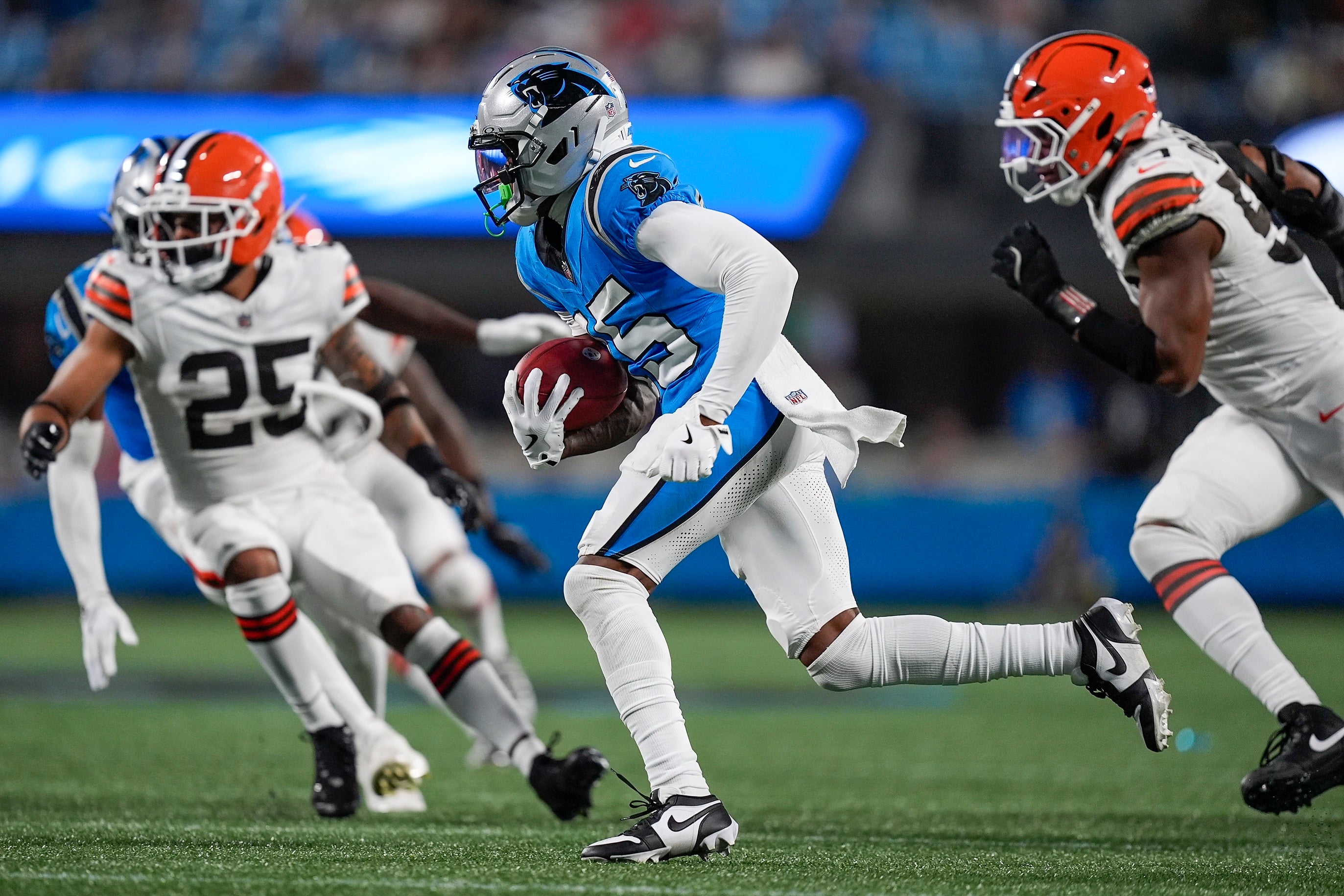 Aug 8, 2025; Charlotte, North Carolina, USA;Carolina Panthers wide receiver Jimmy Horn Jr. (15) runs with the ball against the Cleveland Browns during the second half at Bank of America Stadium.
