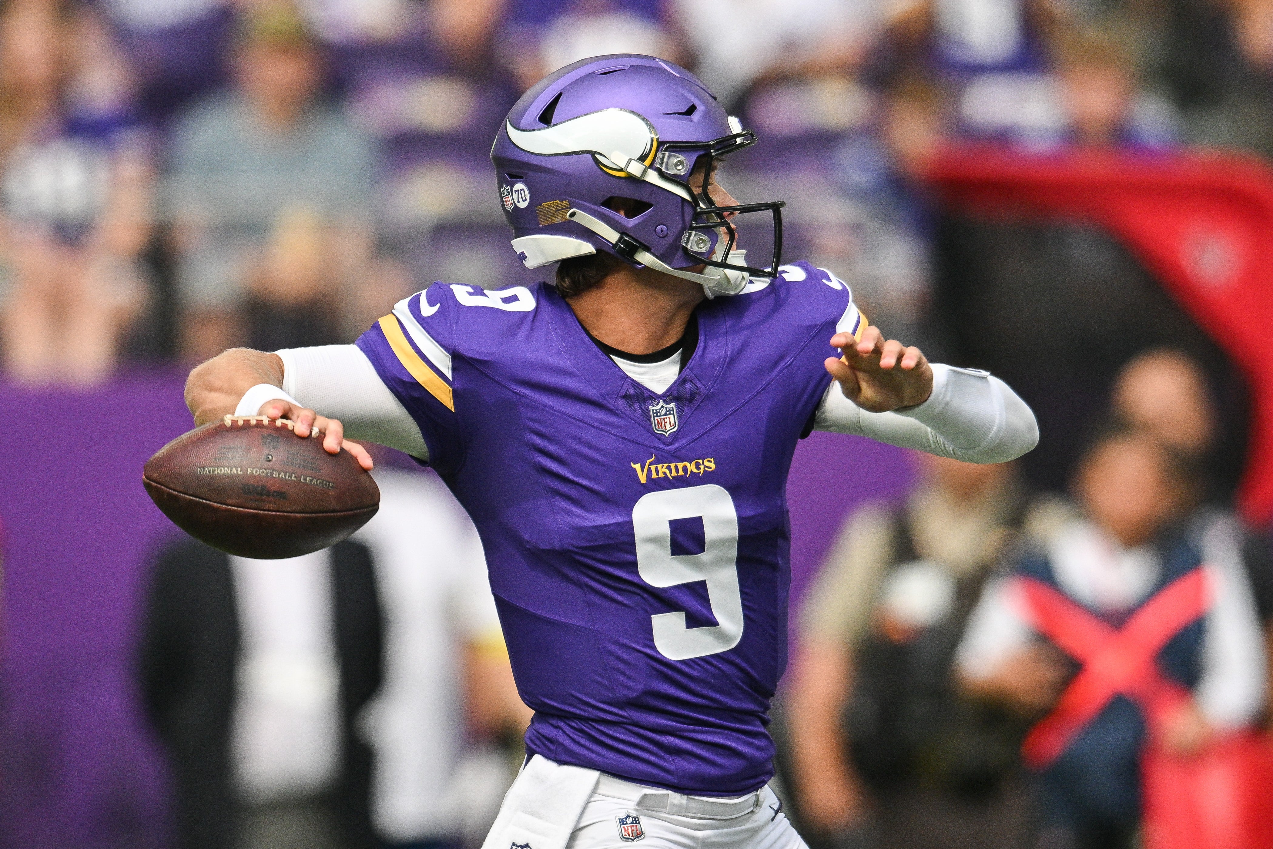 Aug 9, 2025; Minneapolis, Minnesota, USA; Minnesota Vikings quarterback J.J. McCarthy (9) throws a pass against the Houston Texans during the first quarter at U.S. Bank Stadium.
