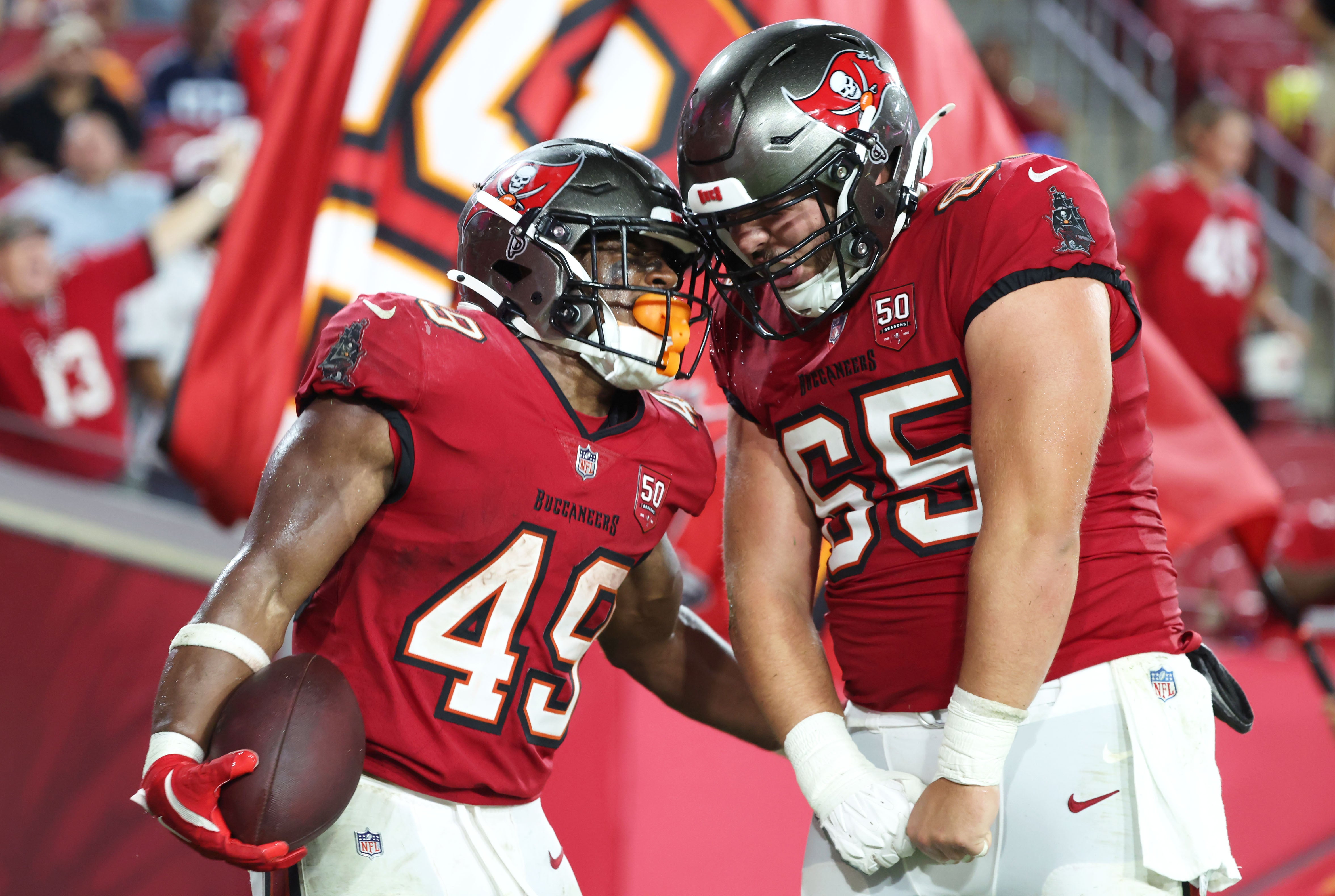 Aug 9, 2025; Tampa, Florida, USA; Tampa Bay Buccaneers running back Owen Wright (49) celebrates after he runs the ball in for a touchdown against the Tennessee Titans during the second half at Raymond James Stadium.