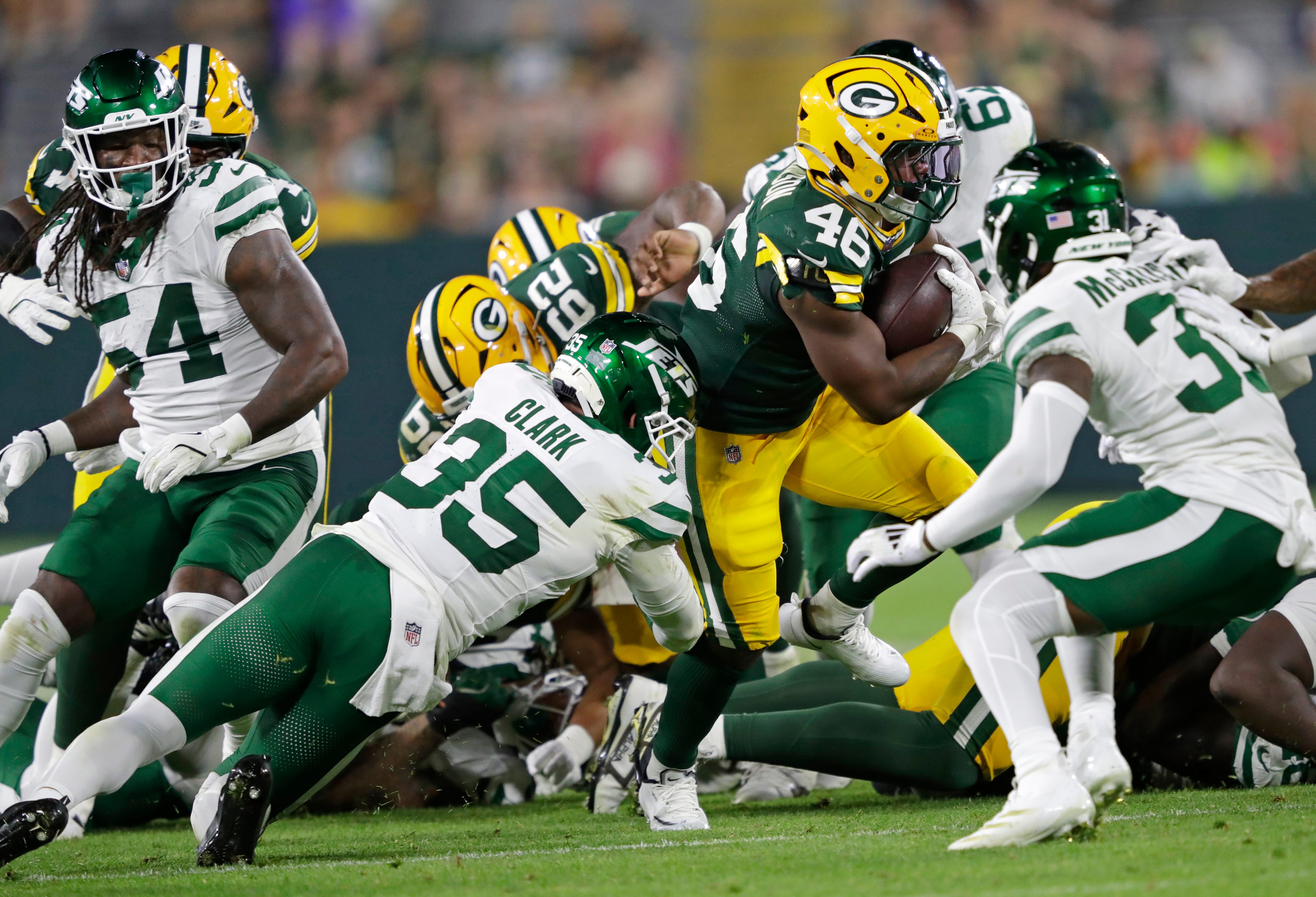 Green Bay Packers running back Amar Johnson (46) breaks away for a long touchdown run against the New York Jets during their football game Saturday, August 9, 2025, at Lambeau Field in Green Bay, Wisconsin.
