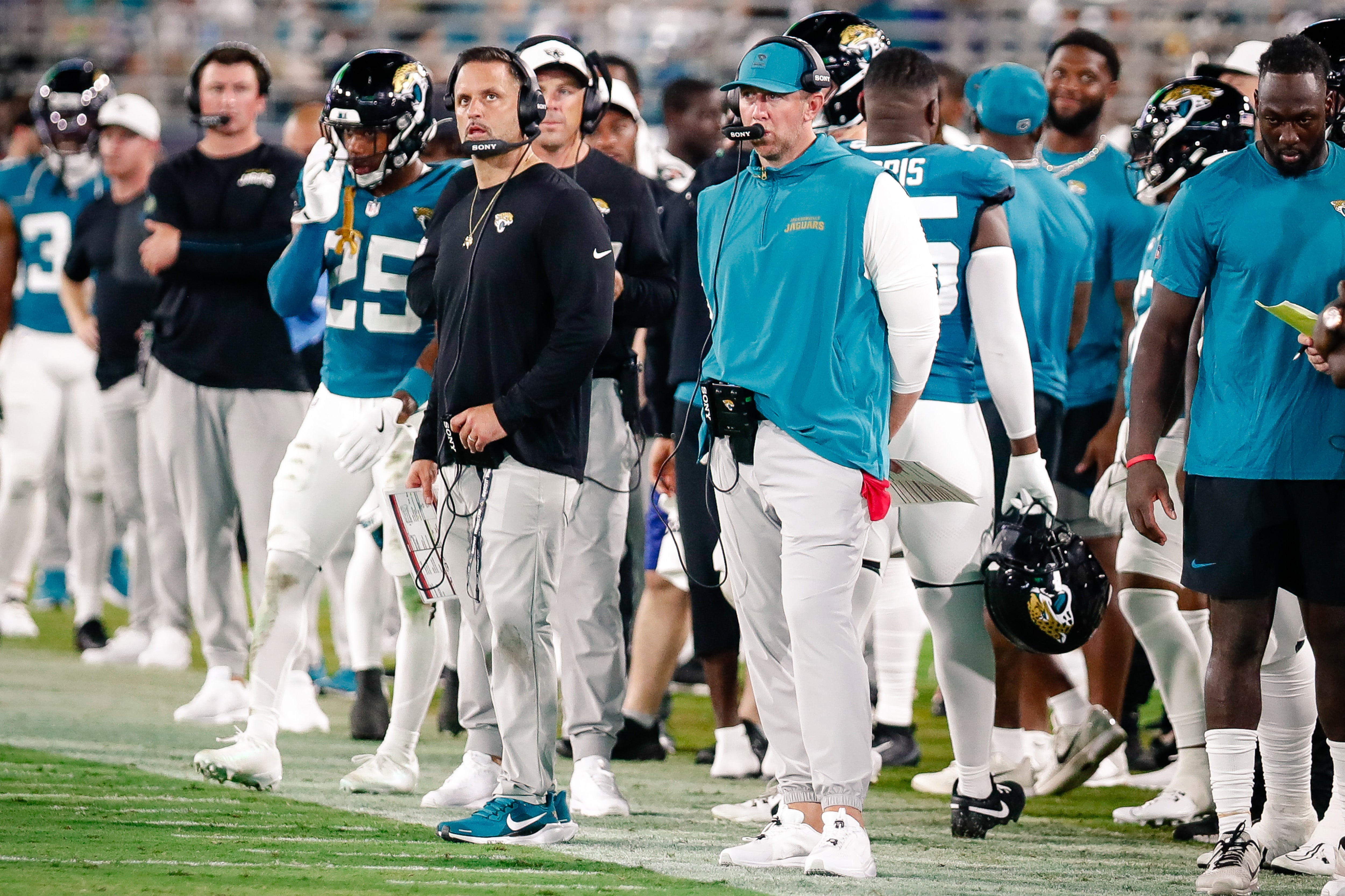 Jacksonville Jaguars defensive coordinator Anthony Campanile stands with head coach Liam Coen on the sidelines during a preseason game against the Pittsburgh Steelers