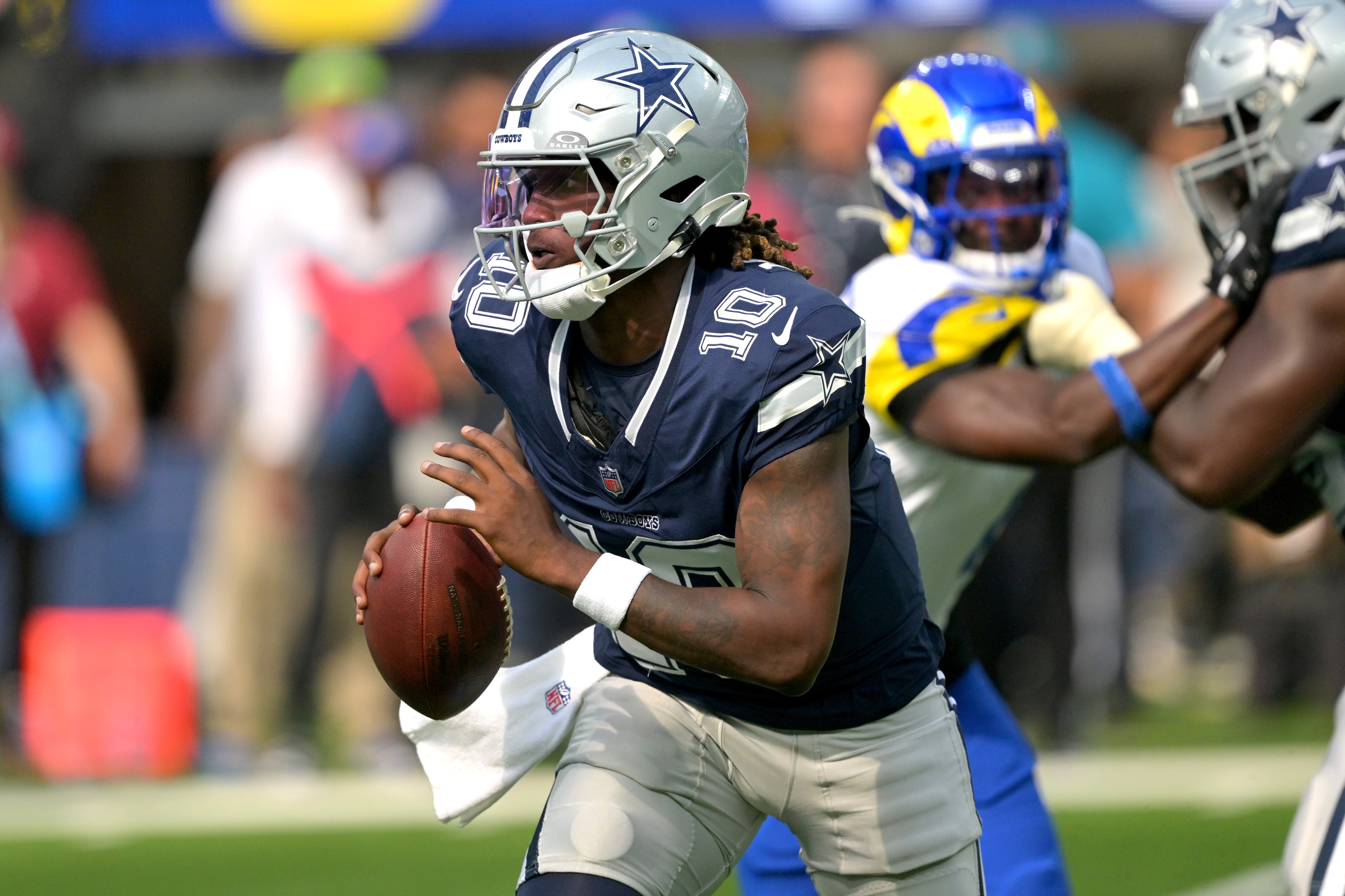 Aug 9, 2025; Inglewood, California, USA; Dallas Cowboys quarterback Joe Milton III (10) looks to pass during the first half against the Los Angeles Rams at SoFi Stadium.