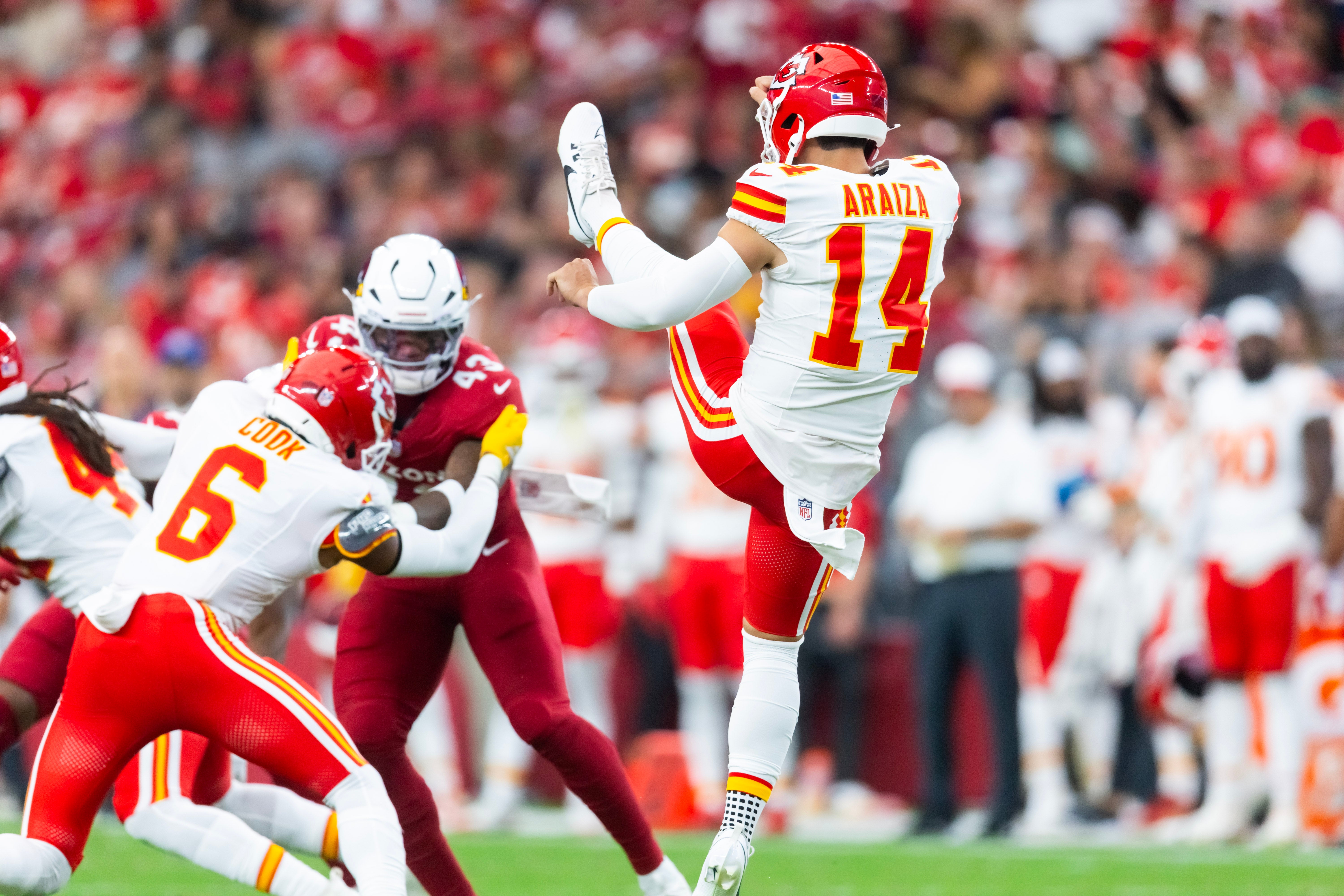 Kansas City Chiefs punter Matt Araiza (14) against the Arizona Cardinals during a preseason NFL game at State Farm Stadium.