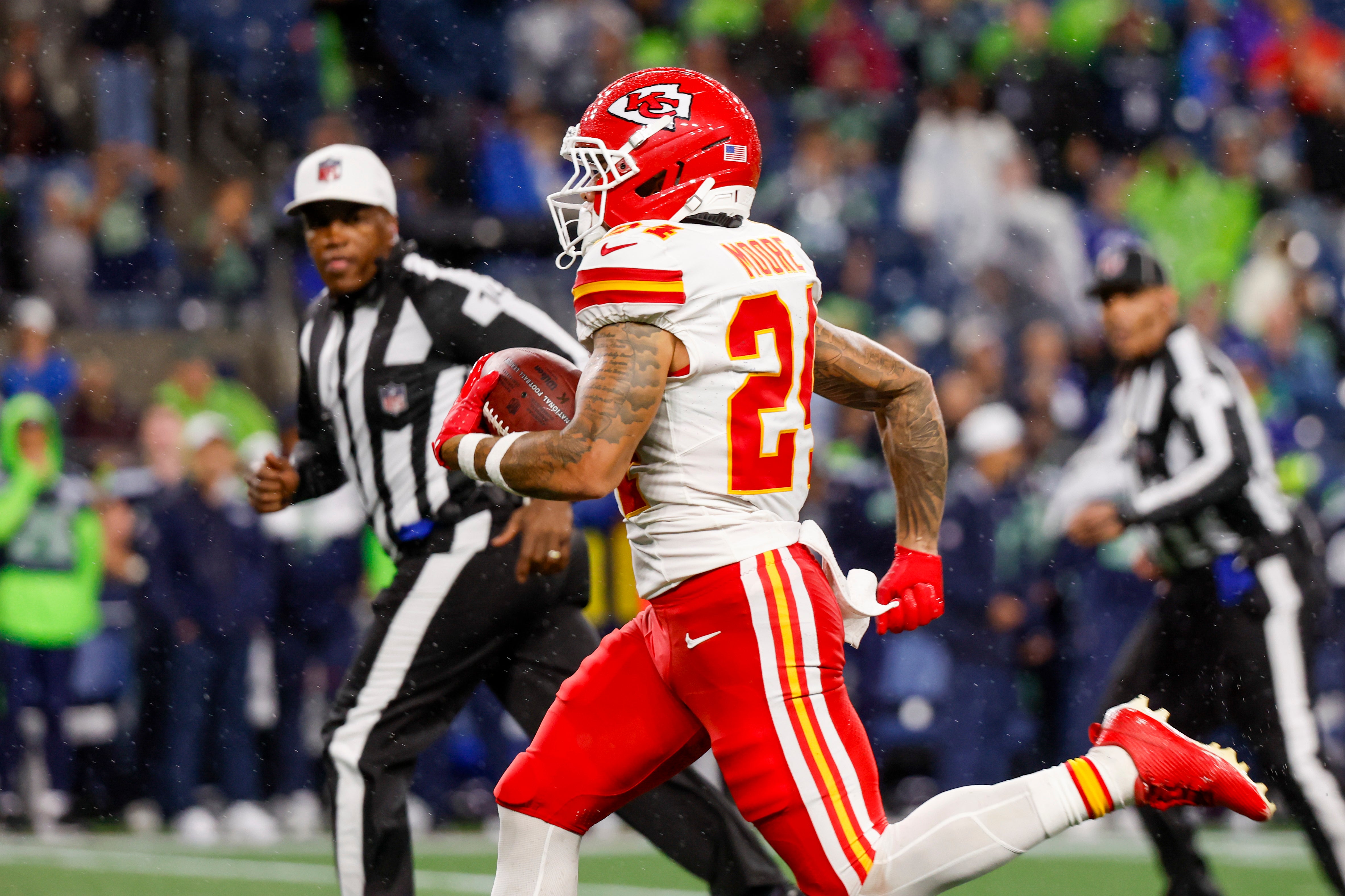 Kansas City Chiefs wide receiver Skyy Moore (24) returns a punt for a touchdown against the Seattle Seahawks during the fourth quarter at Lumen Field.