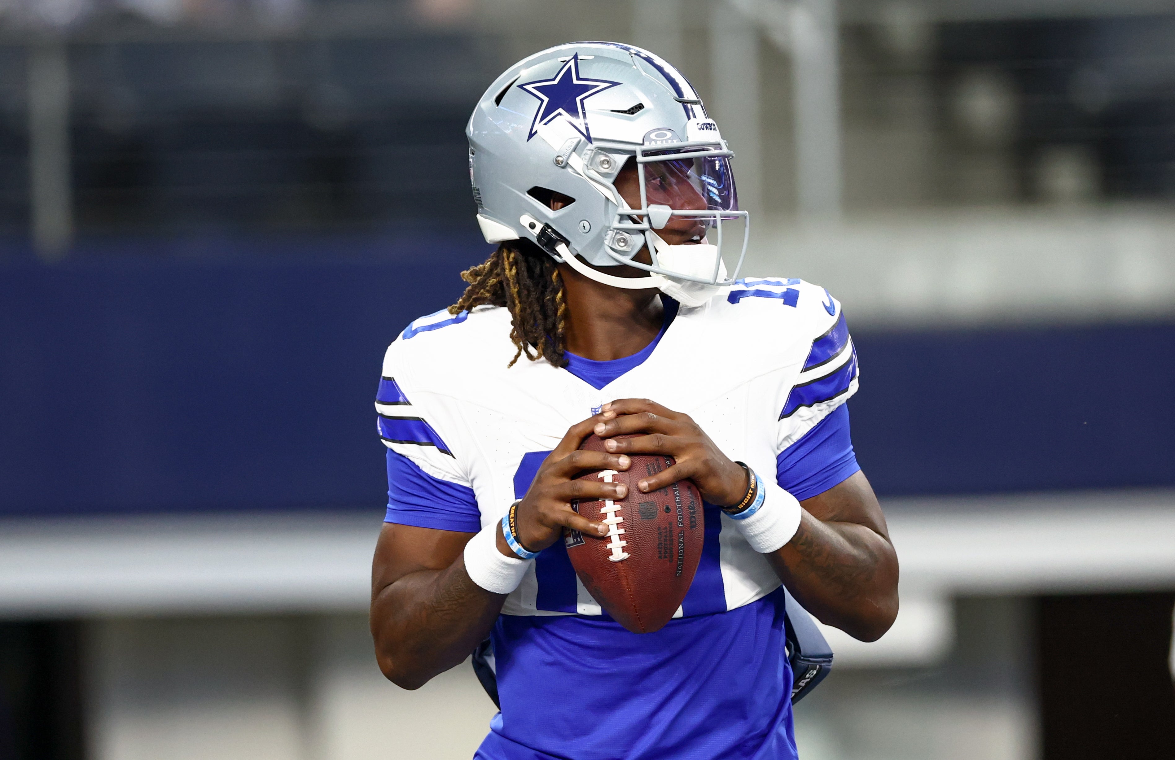 Dallas Cowboys quarterback Joe Milton III (10) warms up before the game against the Baltimore Ravens at AT&T Stadium.