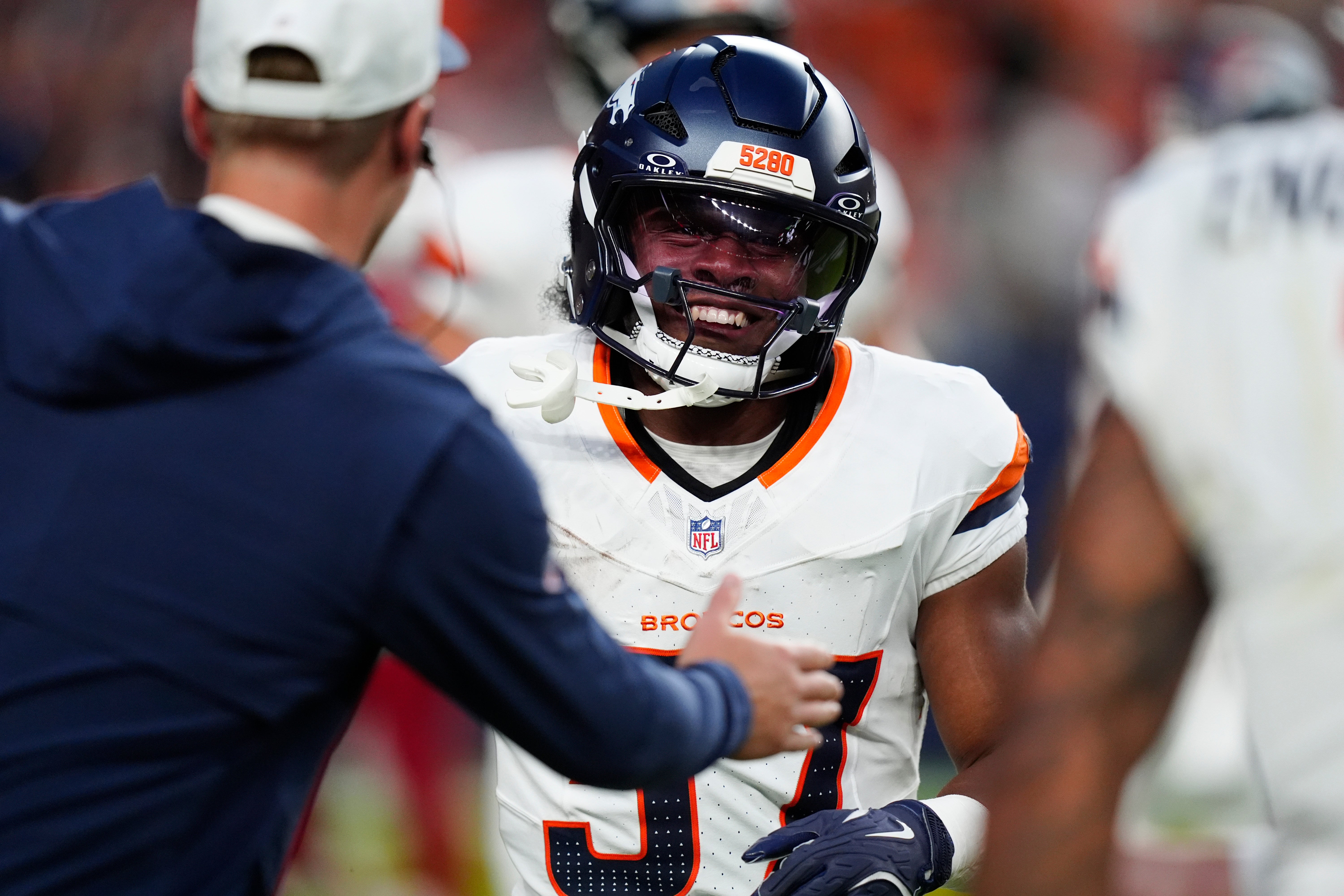 Denver Broncos RB RJ Harvey celebrates with head coach Sean Payton after a TD in preseason Week 2 against the Arizona Cardinals