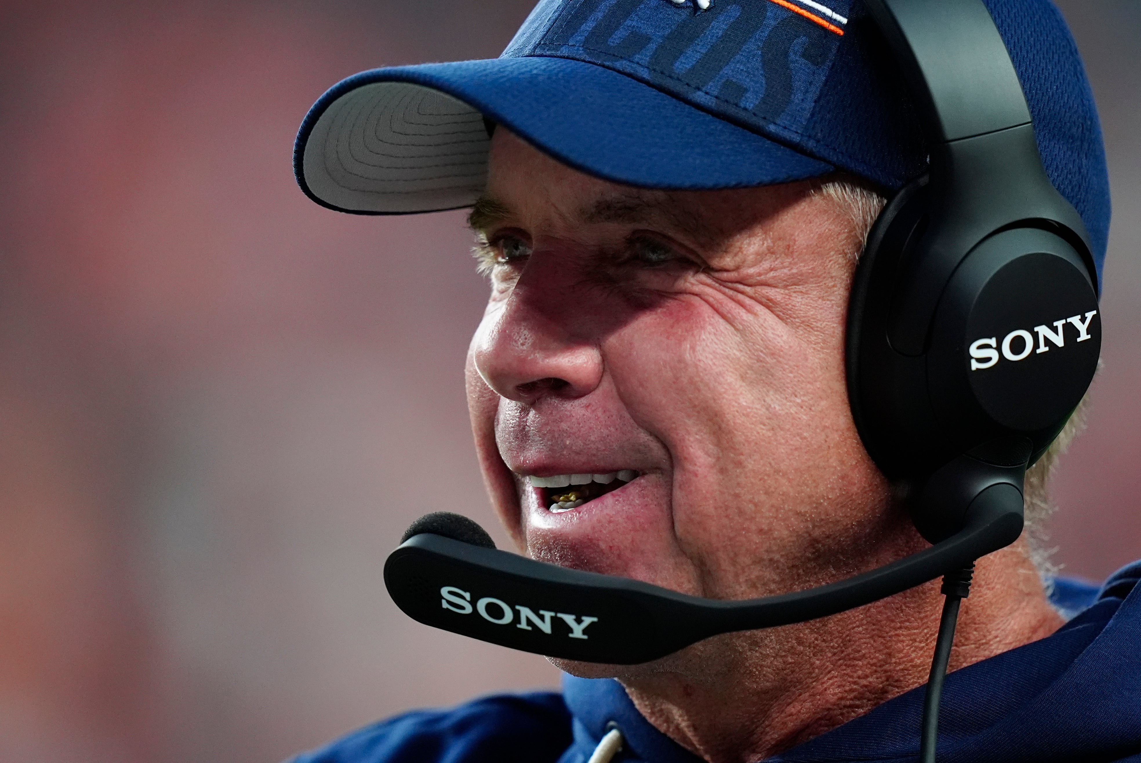 Denver Broncos head coach Sean Payton smiles on the sideline during Week 2 preseason contest against the Arizona Cardinals