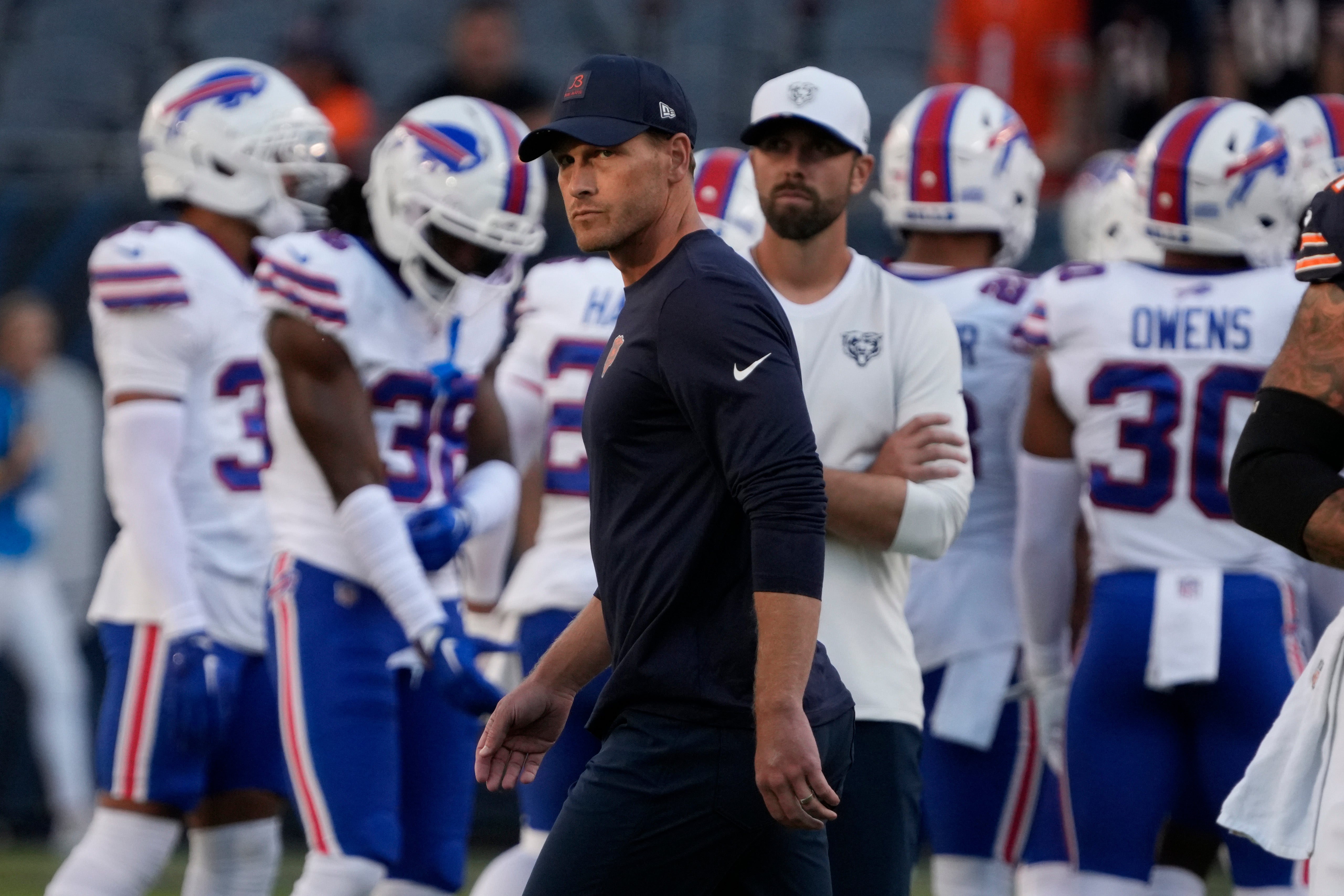Aug 17, 2025; Chicago, Illinois, USA; Chicago Bears head coach Ben Johnson on the field before a game against the Buffalo Bills at Soldier Field.