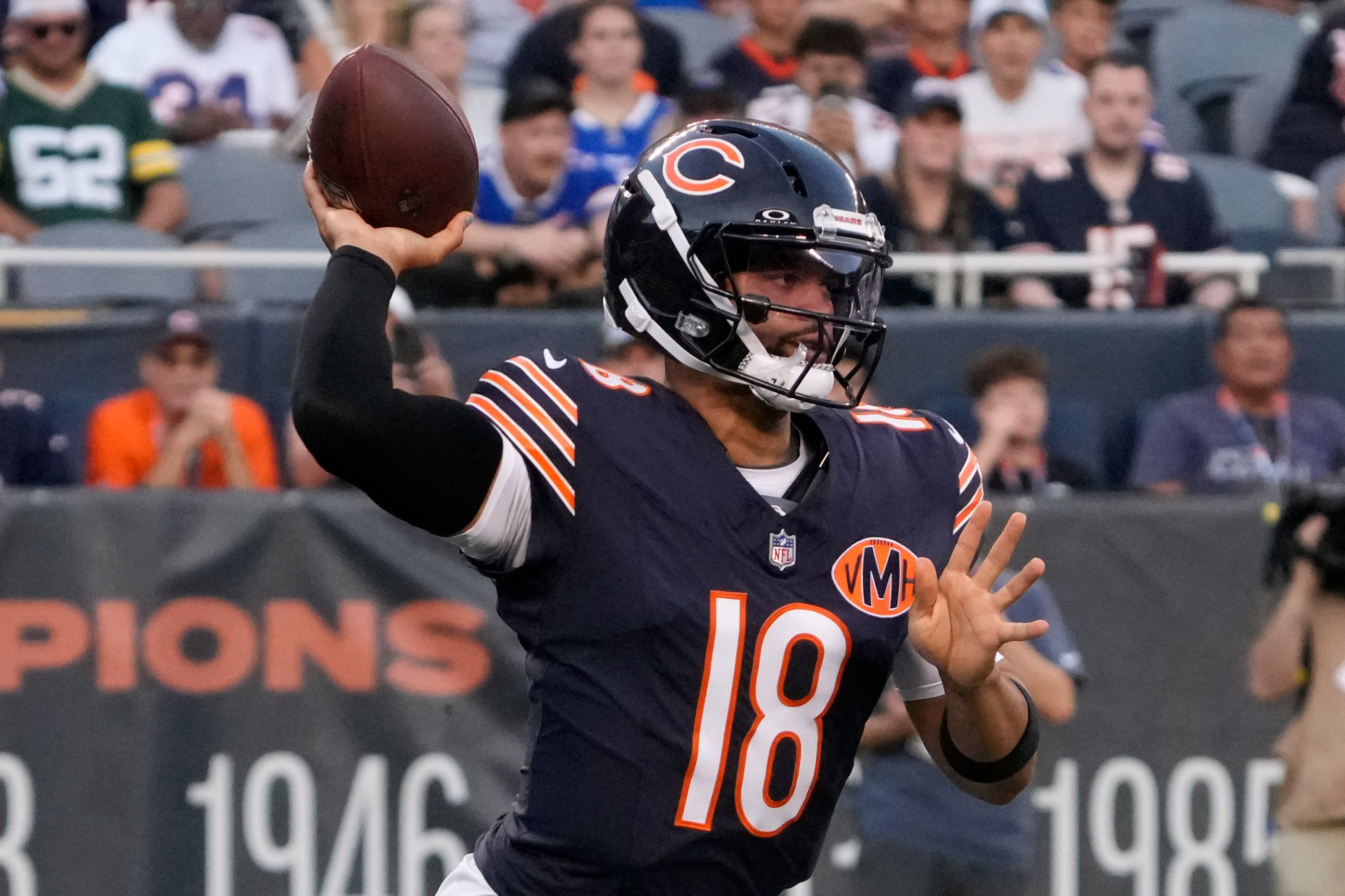 Aug 17, 2025; Chicago, Illinois, USA; Chicago Bears quarterback Caleb Williams (18) looks to pass the ball against the Buffalo Bills during the first quarter at Soldier Field.