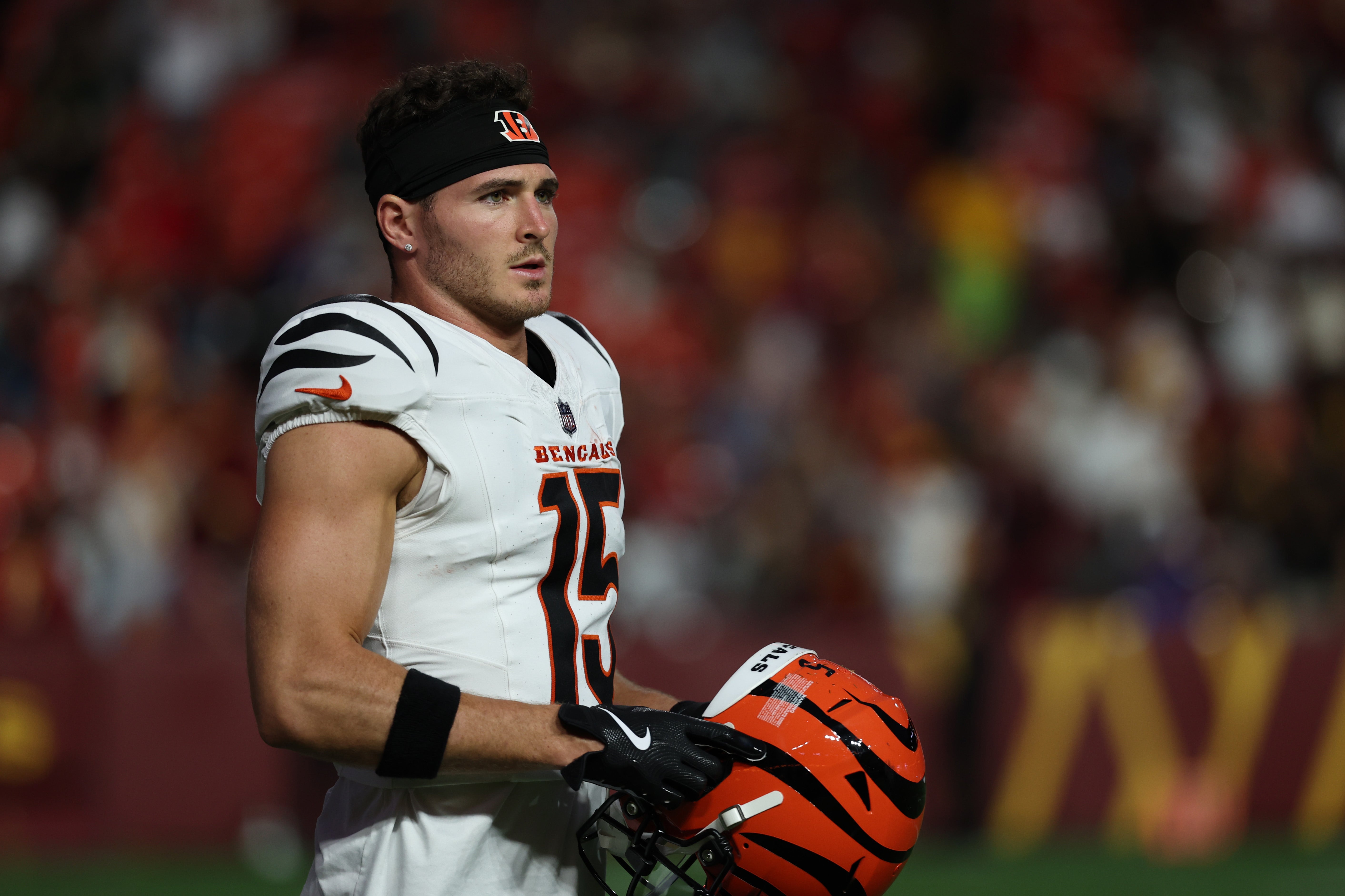 Aug 18, 2025; Landover, Maryland, USA; Cincinnati Bengals wide receiver Charlie Jones (15) looks on during player introductions prior to the game against Washington Commanders at Northwest Stadium.