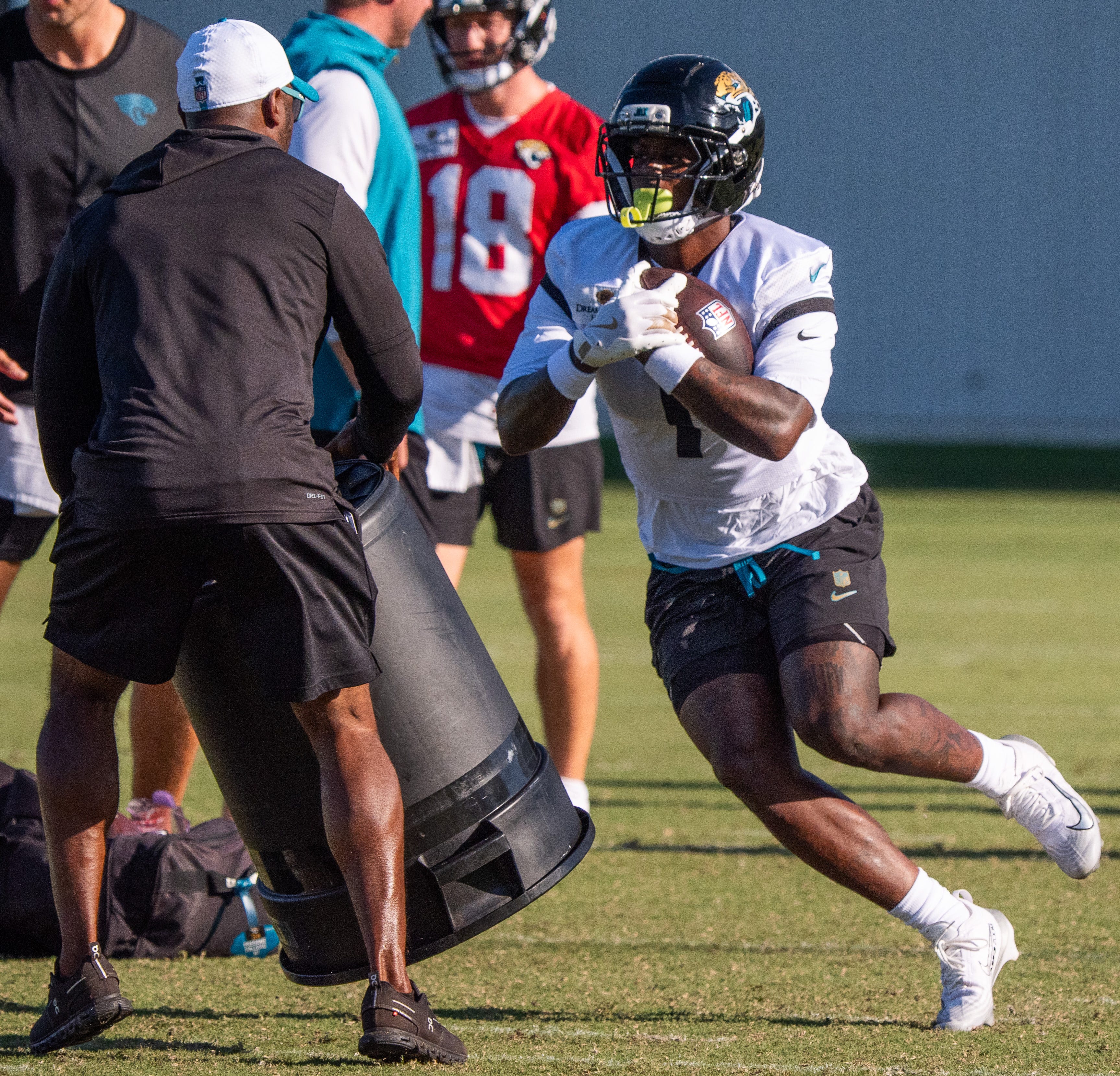 Jacksonville Jaguars running back Travis Etienne Jr. (1) turns it upfield during the Jacksonville Jaguars’ 18th and final training camp practice