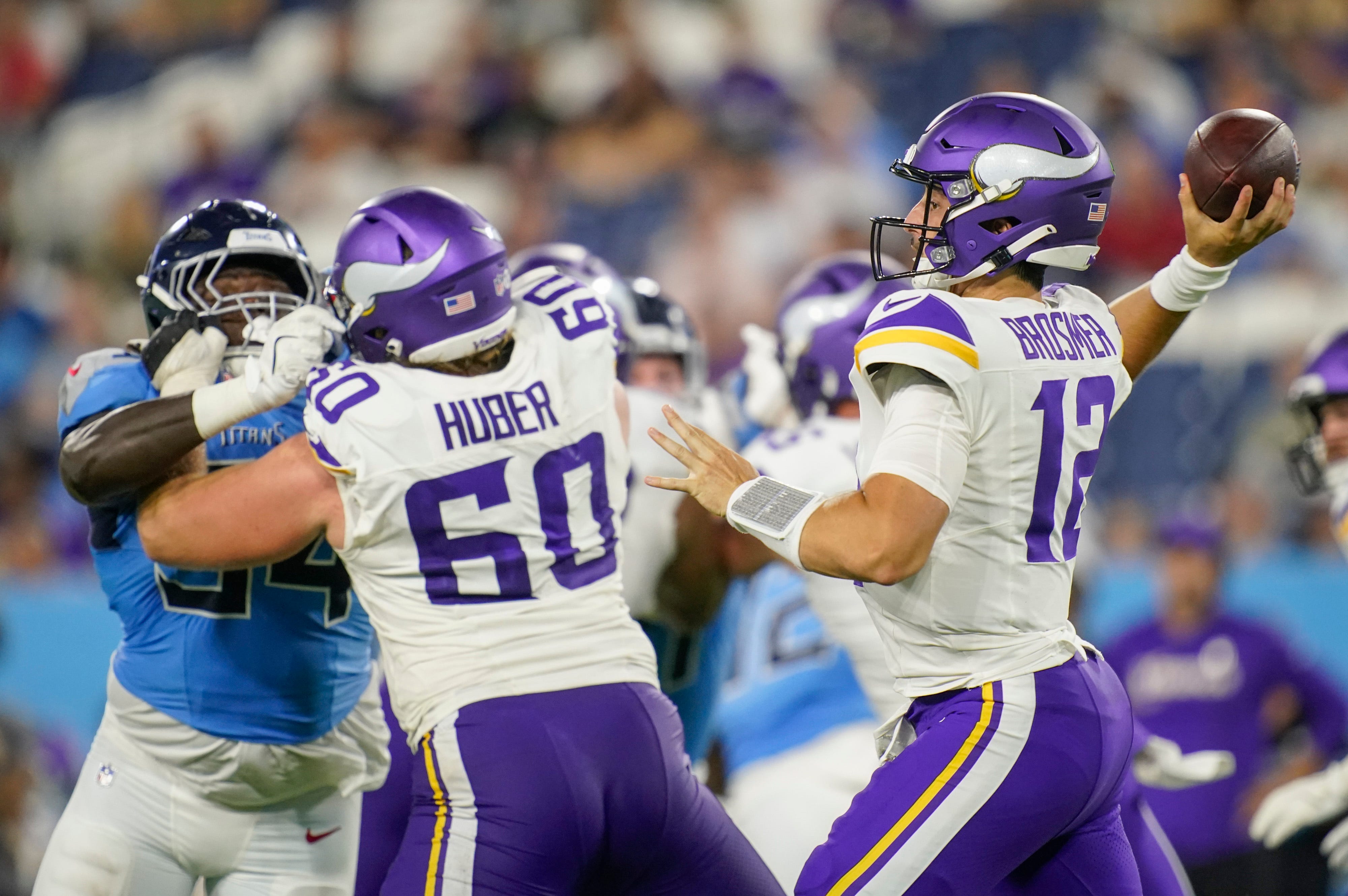Minnesota Vikings quarterback Max Brosmer (12) passes during the third quarter of an NFL pre-season game against the Tennessee Titans at Nissan Stadium in Nashville, Tenn., Friday, Aug. 22, 2025.