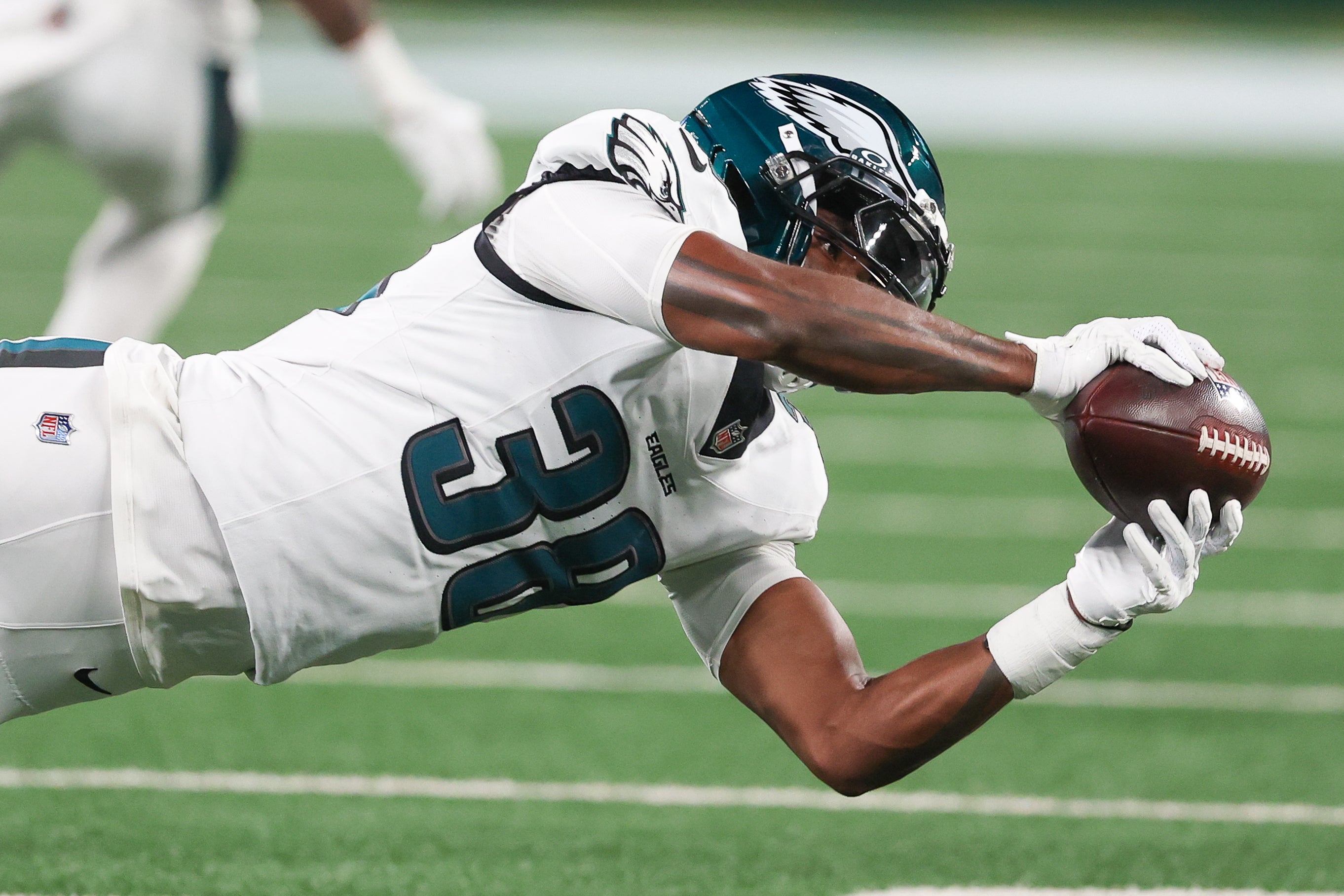 Philadelphia Eagles safety Lewis Cine (38) intercepts a pass during the second half against the New York Jets at MetLife Stadium. Vincent Carchietta-Imagn Images