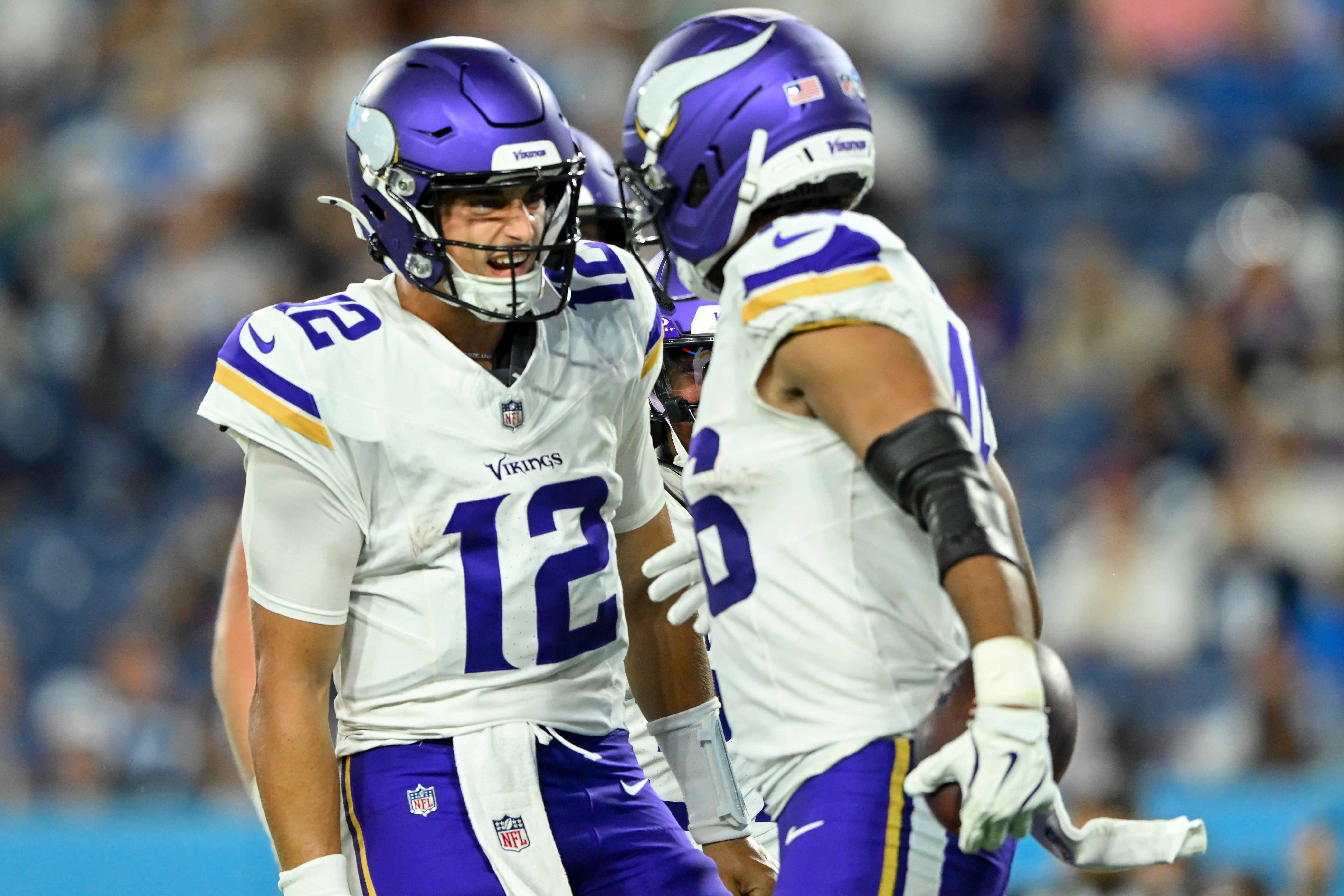 Aug 22, 2025; Nashville, Tennessee, USA; Minnesota Vikings tight end Bryson Nesbit (46) celebrates his touchdown with Minnesota Vikings quarterback Max Brosmer (12) against the Tennessee Titan during the second half at Nissan Stadium.