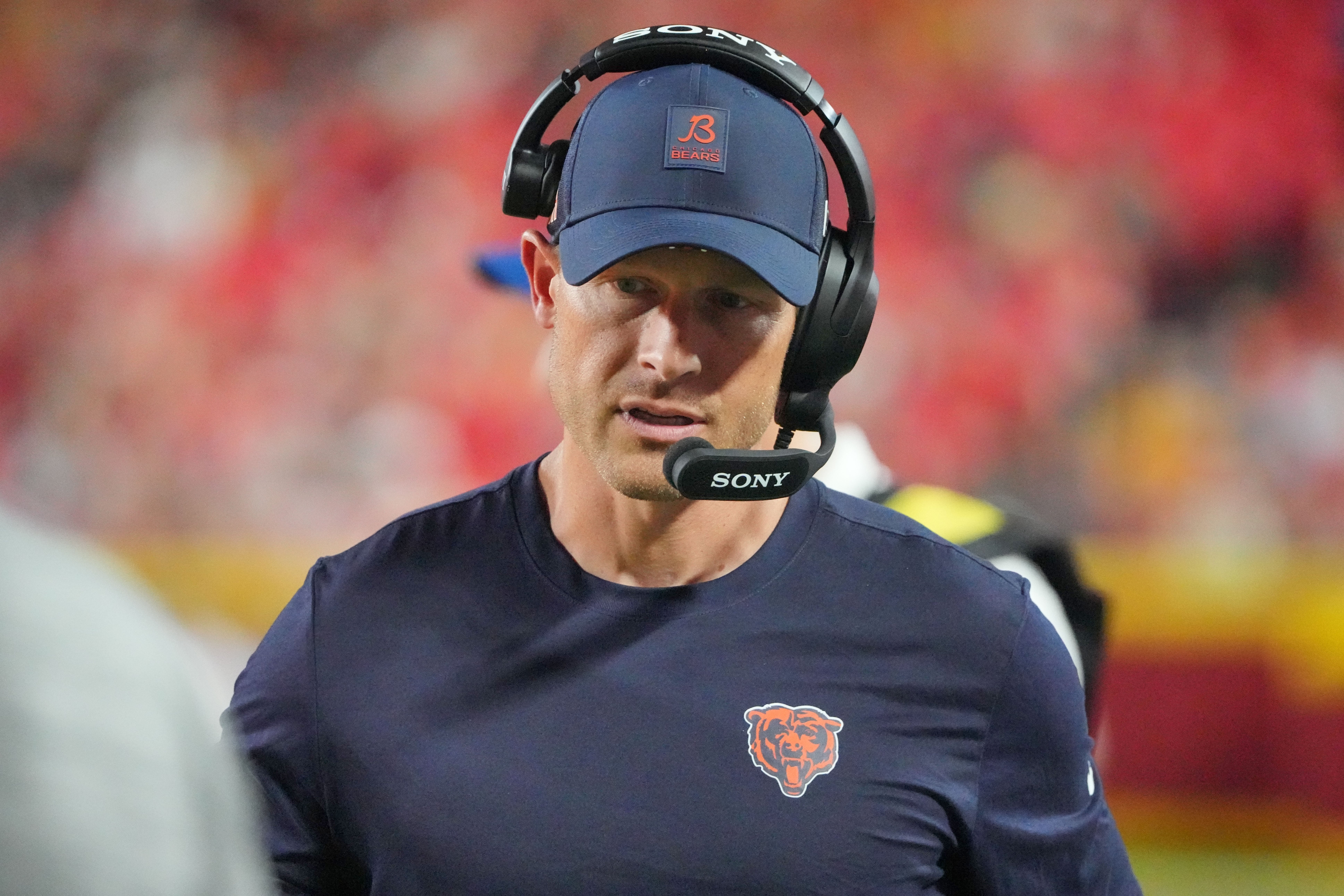 Aug 22, 2025; Kansas City, Missouri, USA; Chicago Bears head coach Ben Johnson on field against the Kansas City Chiefs during the second half of the game at GEHA Field at Arrowhead Stadium.