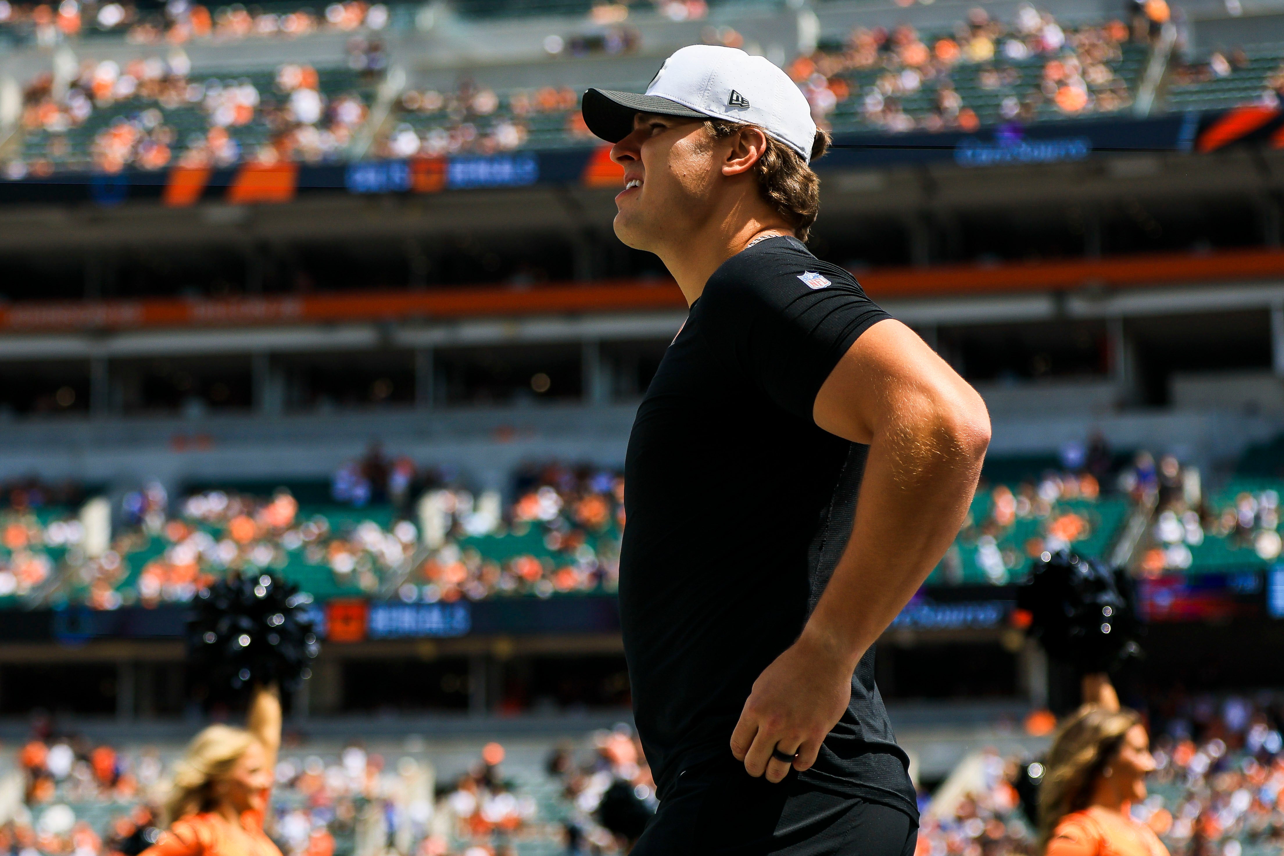 Aug 23, 2025; Cincinnati, Ohio, USA; Cincinnati Bengals defensive end Trey Hendrickson (91) walks onto the field before the game against the Indianapolis Colts at Paycor Stadium.