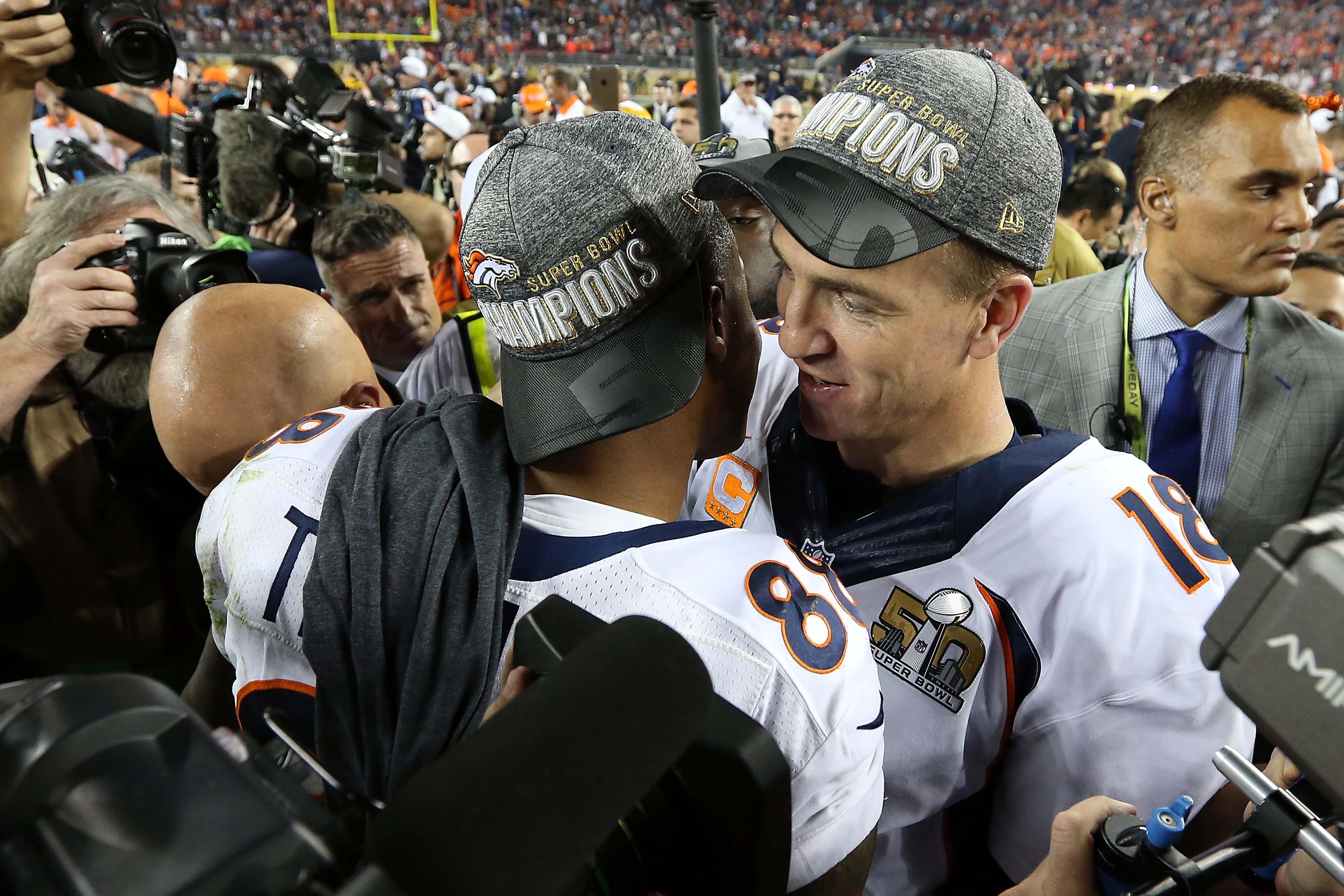 Denver Broncos QB Peyton Manning talks to WR Demaryius Thomas after winning Super Bowl