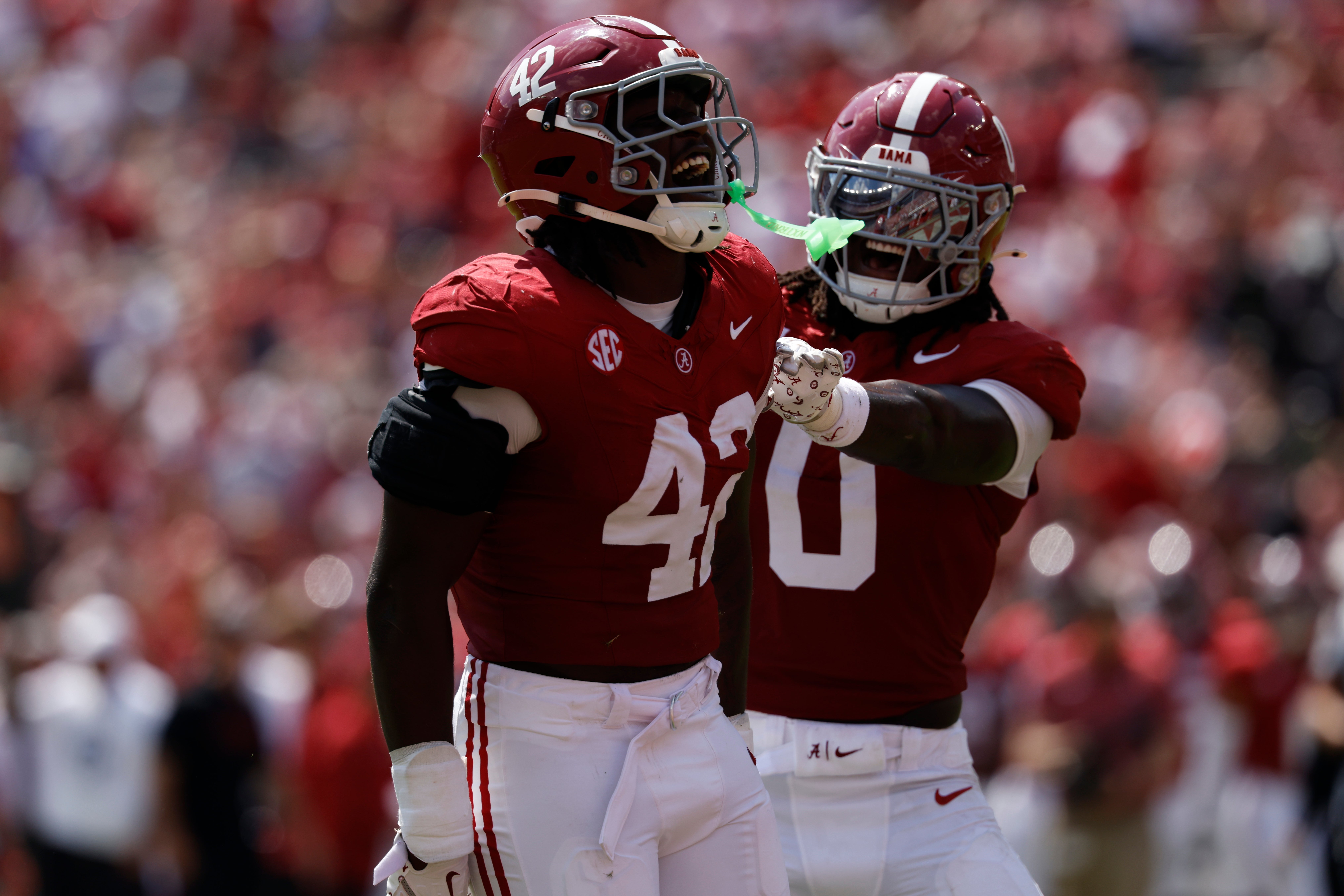Alabama linebackers Yhonzae Pierre and Deontae Lawson