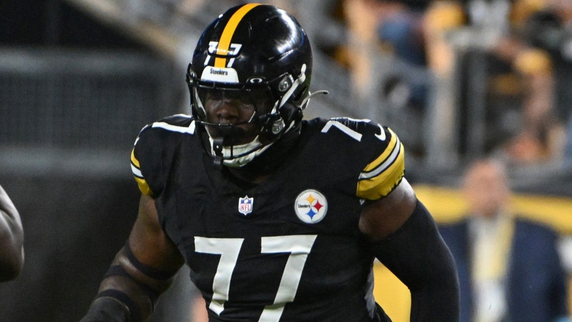 Oct 6, 2024; Pittsburgh, Pennsylvania, USA; Pittsburgh Steelers offensive tackle Broderick Jones (77) pass blocks during the first quarter against the Dallas Cowboys at Acrisure Stadium.