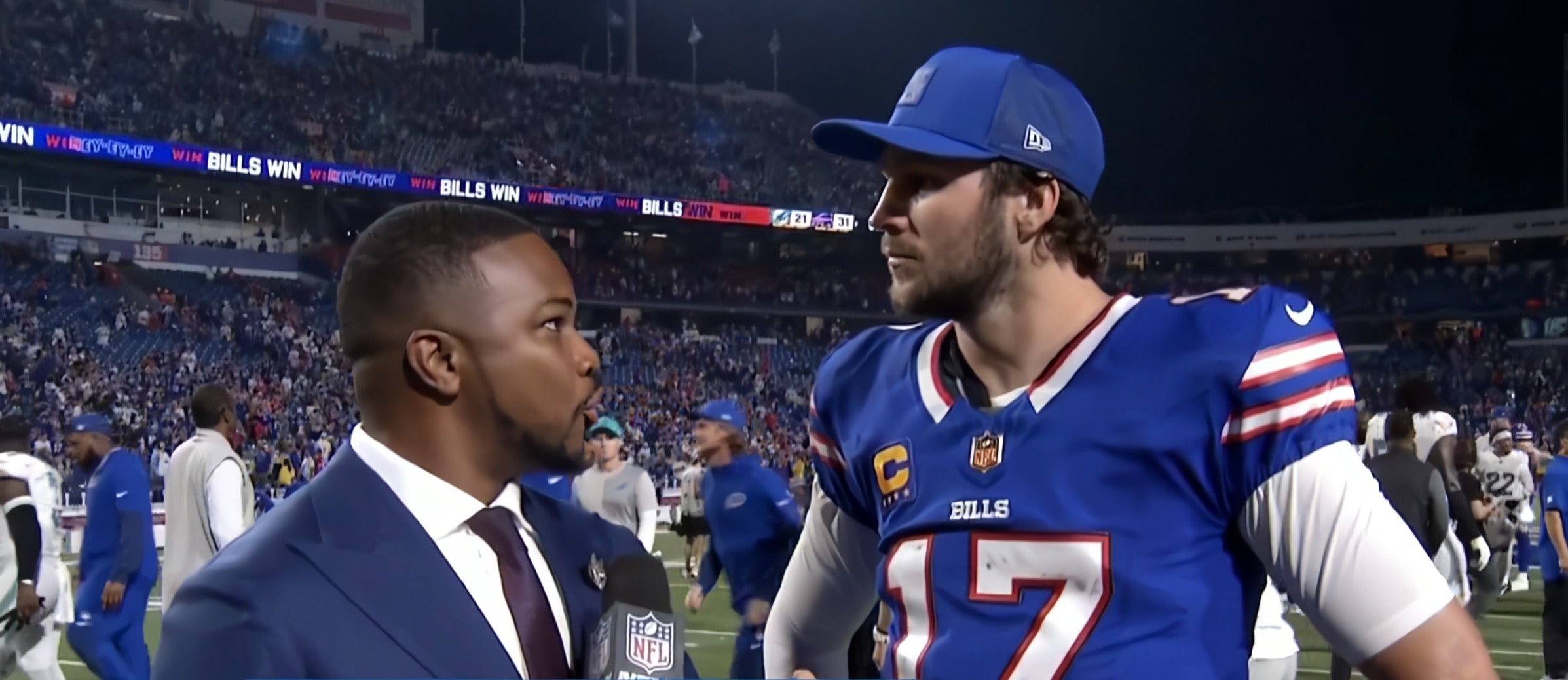 Buffalo Bills QB Josh Allen speaks to Cameron Wolfe after making NFL history in Week 3 win vs. Dolphins