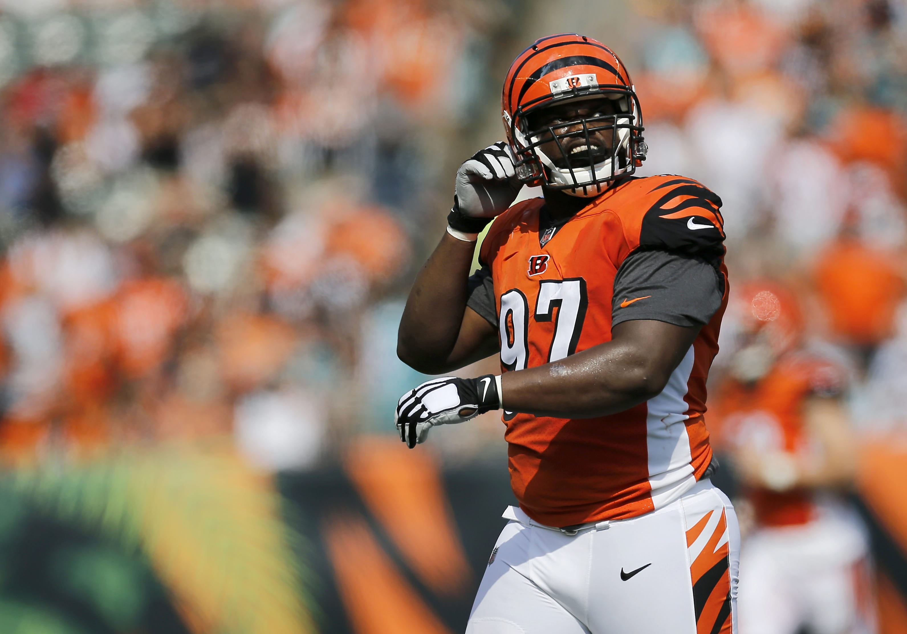 Cincinnati Bengals defensive tackle Geno Atkins (97) looks to the video board as he comes off the field in the first quarter of the NFL Week 5 game between the Cincinnati Bengals and the Miami Dolphins at Paul Brown Stadium in downtown Cincinnati on Sunday, Oct. 7, 2018.