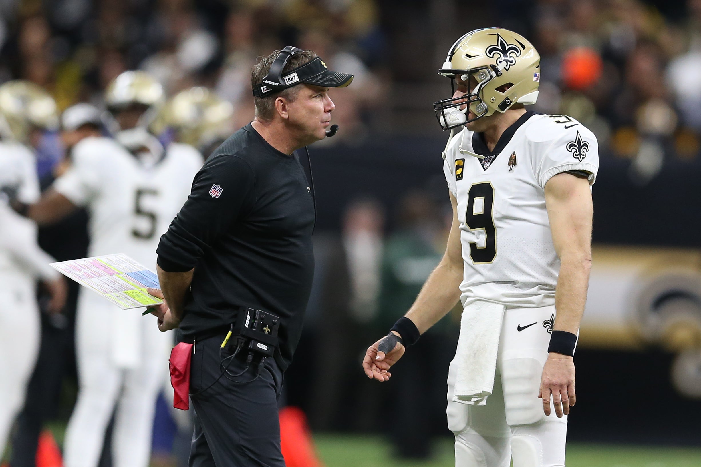 Jan 5, 2020; New Orleans, Louisiana, USA; New Orleans Saints quarterback Drew Brees (9) talks with head coach Sean Payton during the fourth quarter of a NFC Wild Card playoff football game against the Minnesota Vikings at the Mercedes-Benz Superdome.