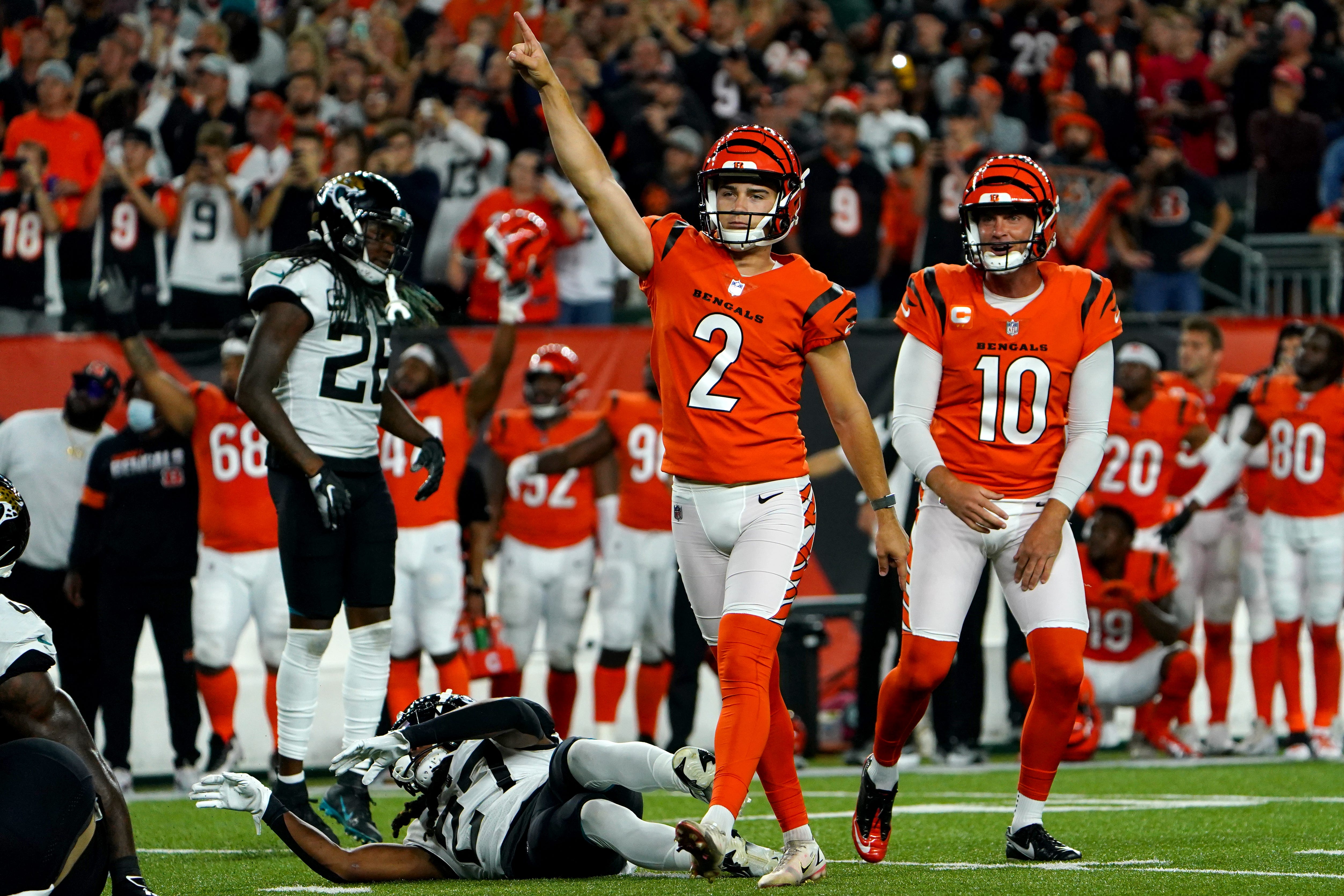Cincinnati Bengals kicker Evan McPherson (2) celebrates after kicking the game-winning field goal in the fourth quarter during a Week 4 NFL football game against the Jacksonville Jaguars, Thursday, Sept. 30, 2021, at Paul Brown Stadium in Cincinnati.