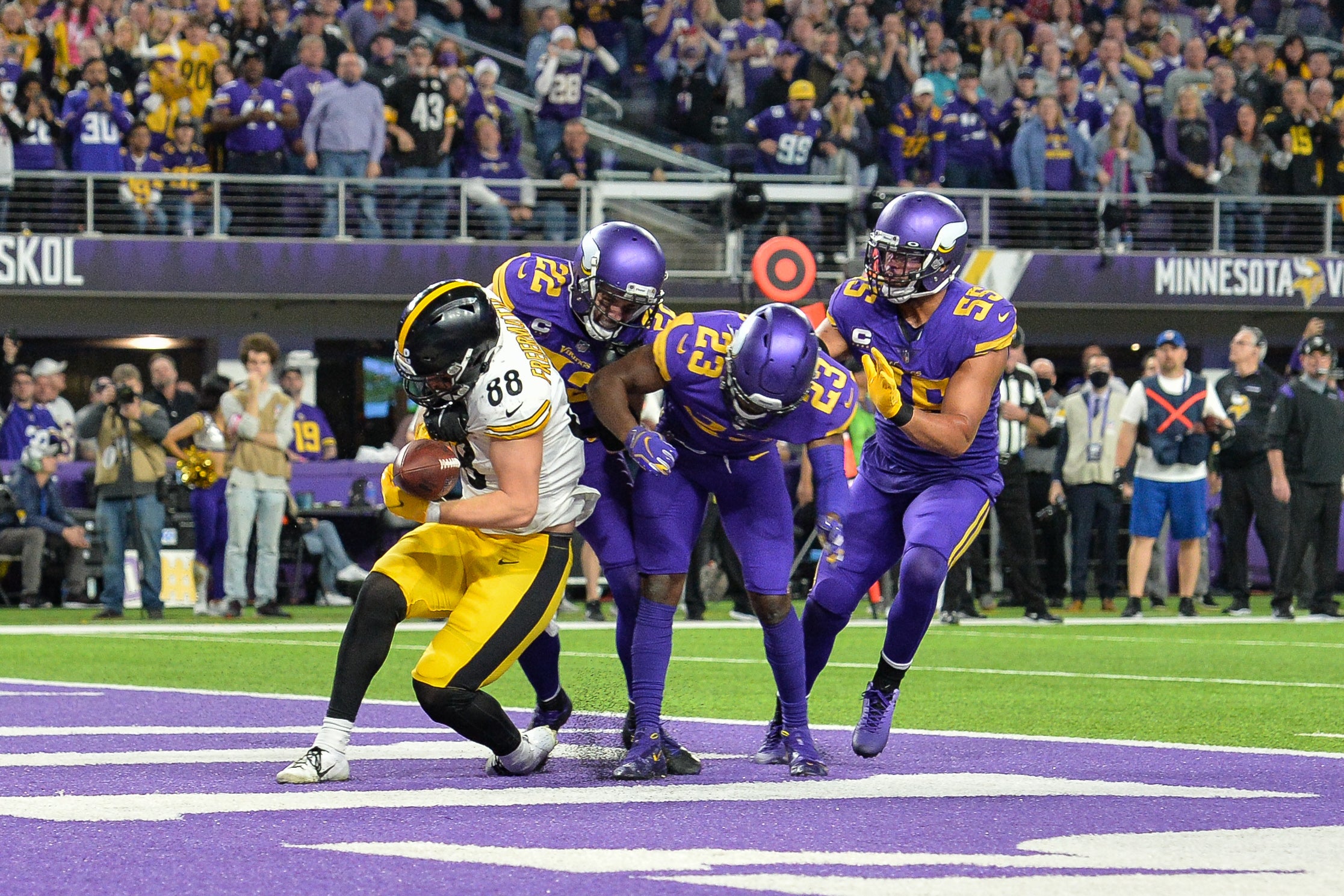 Dec 9, 2021; Minneapolis, Minnesota, USA; Minnesota Vikings safety Harrison Smith (22) and free safety Xavier Woods (23) and outside linebacker Anthony Barr (55) breakup the final pass of the game intended for Pittsburgh Steelers tight end Pat Freiermuth (88) in the endzone during the fourth quarter at U.S. Bank Stadium.
