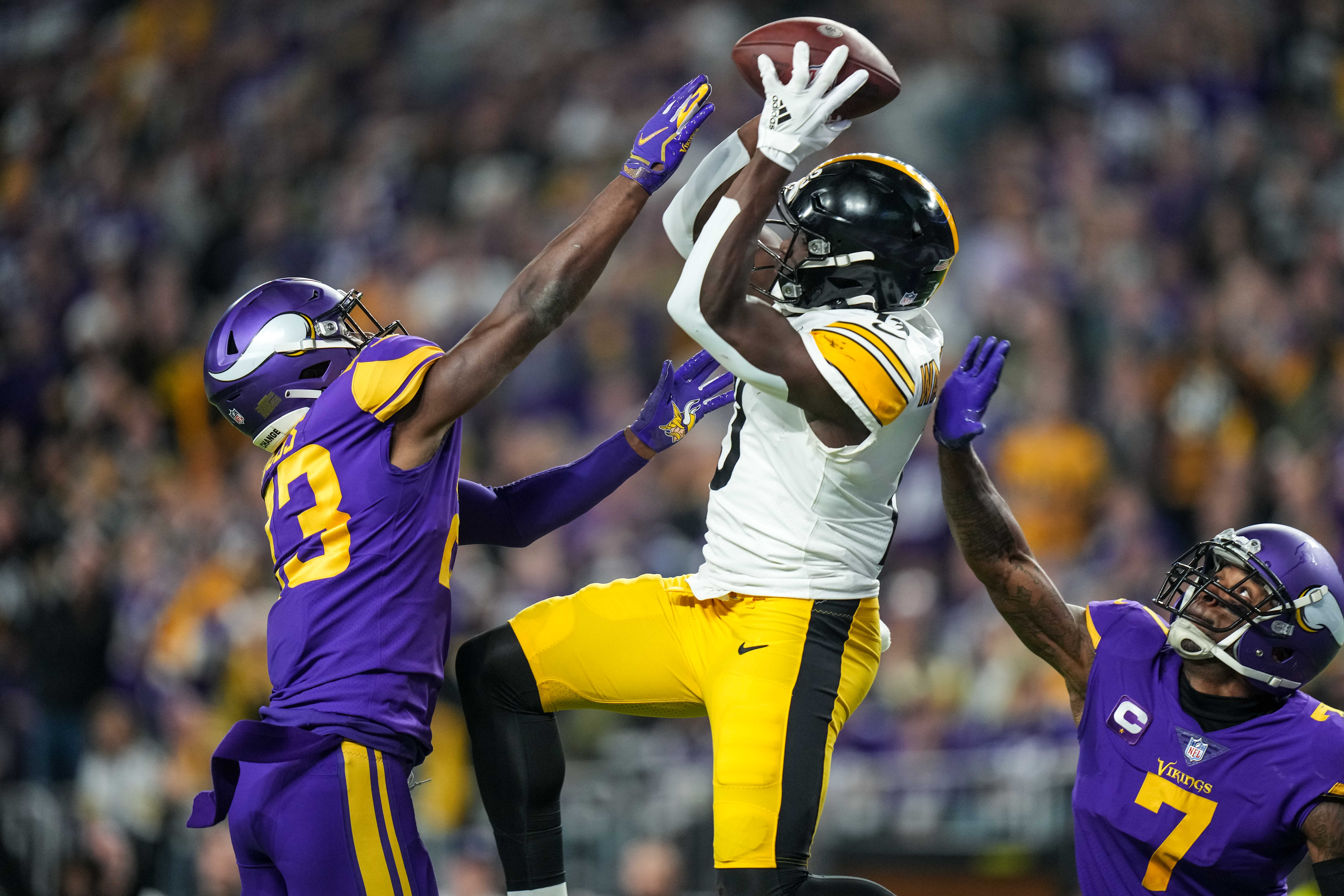Dec 9, 2021; Minneapolis, Minnesota, USA; Pittsburgh Steelers wide receiver James Washington (13) catches a touchdown pass during the fourth quarter against the Minnesota Vikings at U.S. Bank Stadium.