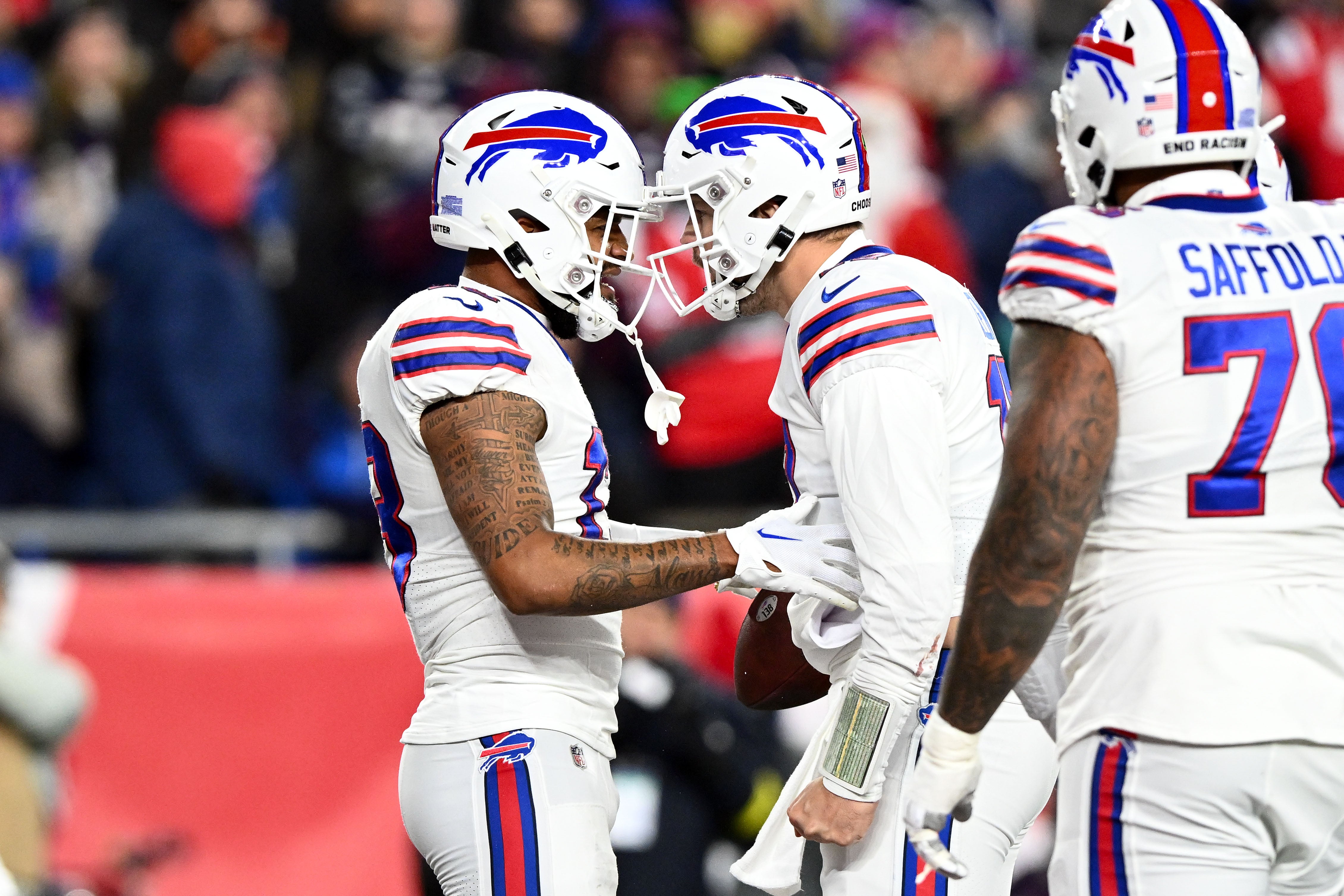 Dec 1, 2022; Foxborough, Massachusetts, USA; Buffalo Bills wide receiver Gabe Davis (13) celebrates with Buffalo quarterback Josh Allen (17) after scoring a touchdown against the New England Patriots during the first half at Gillette Stadium.