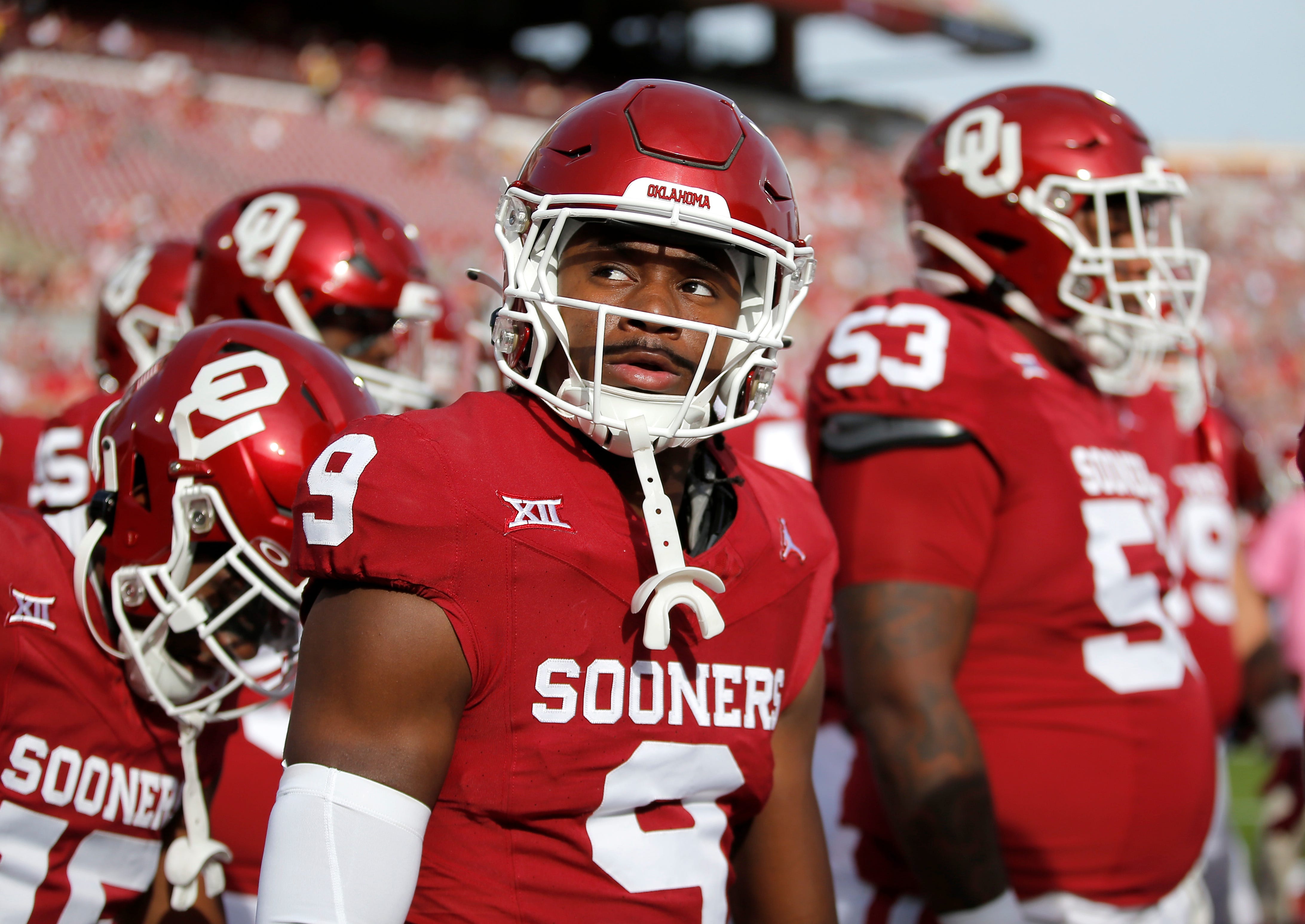 Oklahoma's Gentry Williams (9) warms up before the college football game between the University of Oklahoma Sooners and the University of Central Florida Knights at the Gaylord Family Oklahoma Memorial Stadium in Norman, Okla., Saturday, Oct., 21, 2023.