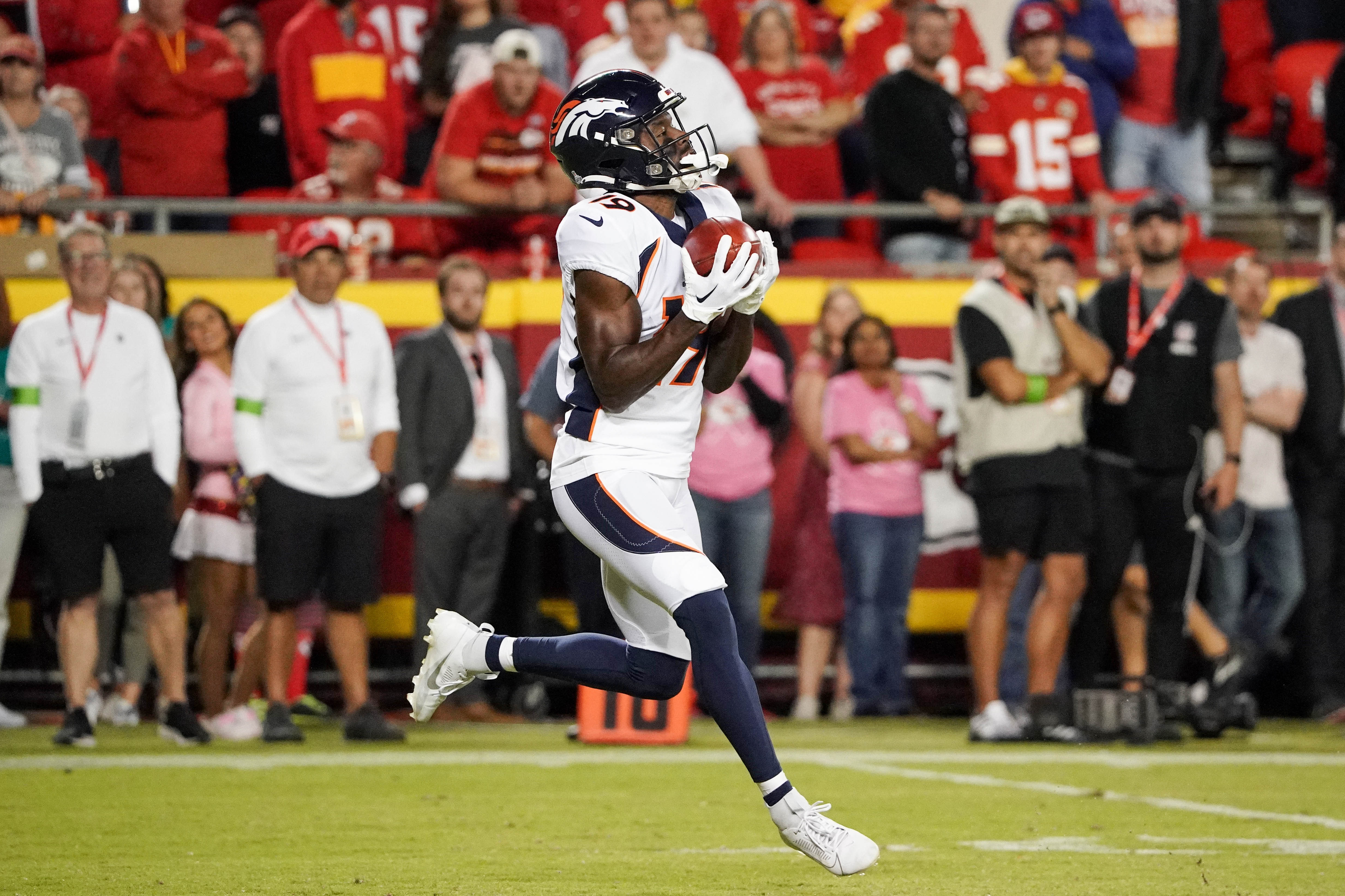 Oct 12, 2023; Kansas City, Missouri, USA; Denver Broncos wide receiver Marvin Mims Jr. (19) receives a punt against the Kansas City Chiefs during the game at GEHA Field at Arrowhead Stadium.