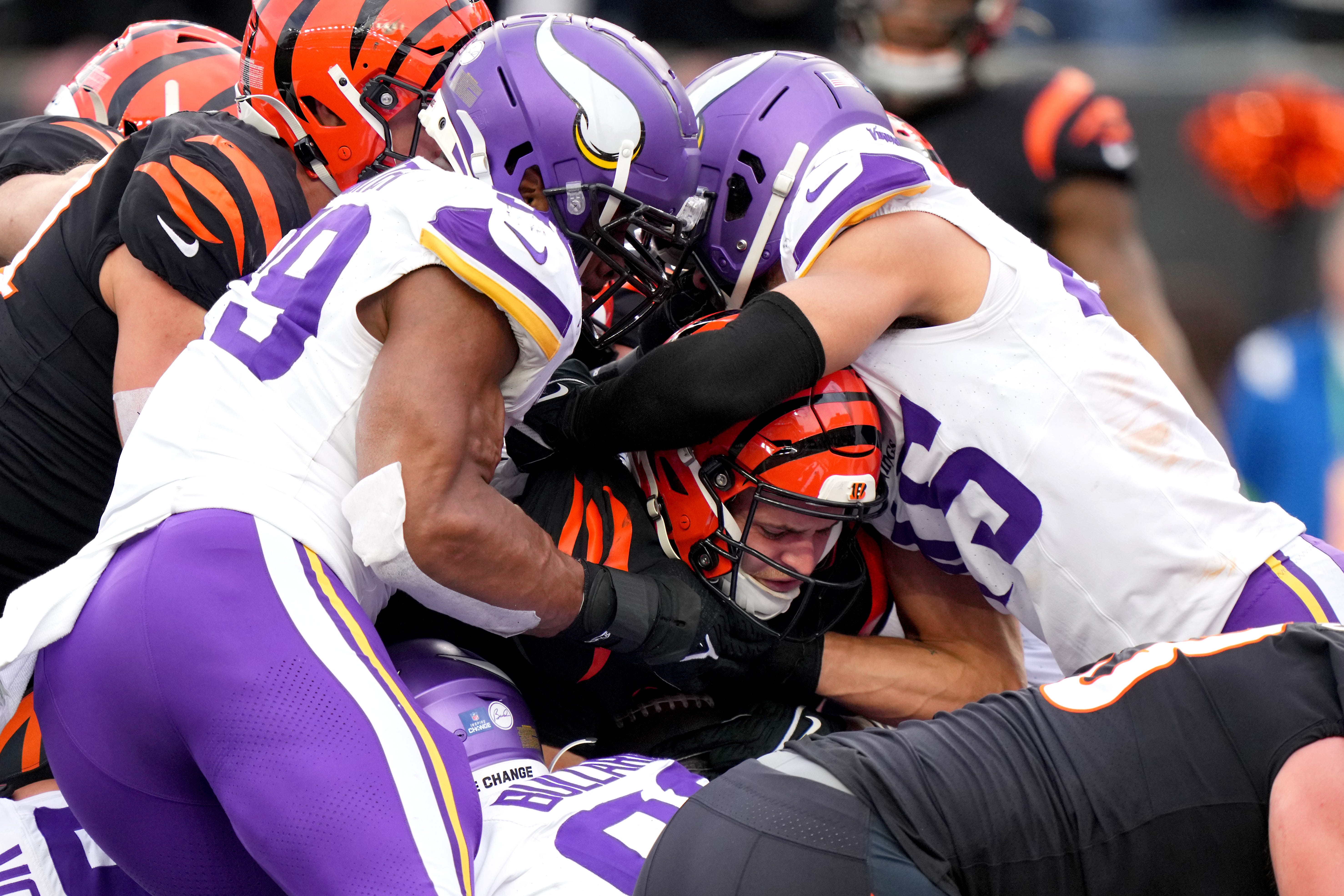 Cincinnati Bengals quarterback Jake Browning (6) is unsuccessful on a quarterback sneak in the fourth quarter of a Week 15 NFL football game between the Minnesota Vikings and the Cincinnati Bengals, Saturday, Dec. 16, 2023, at Paycor Stadium in Cincinnati. The Cincinnati Bengals won 27-24 in overtime.