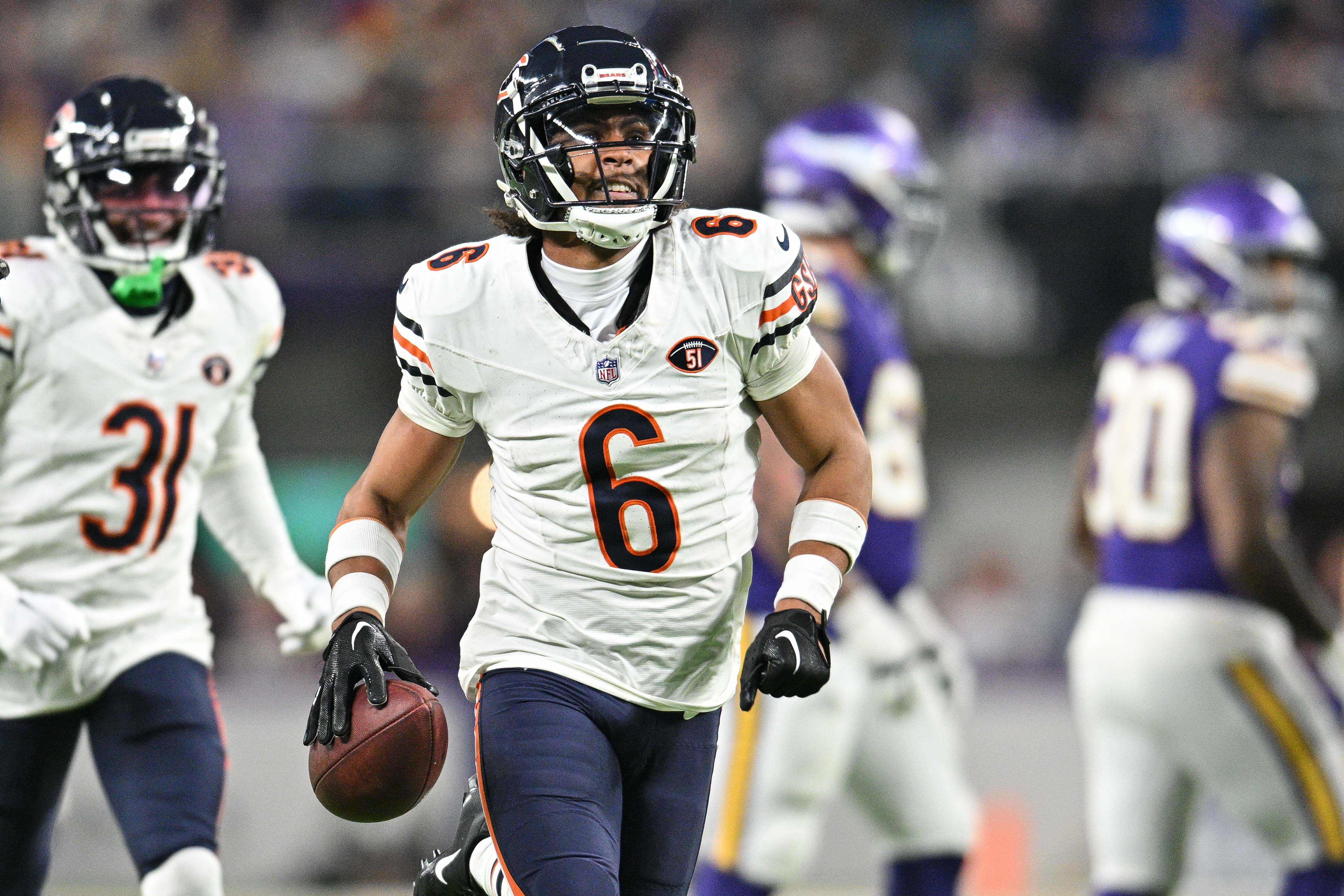 Nov 27, 2023; Minneapolis, Minnesota, USA; Chicago Bears cornerback Kyler Gordon (6) reacts after an interception off Minnesota Vikings quarterback Joshua Dobbs (not pictured) during the fourth quarter at U.S. Bank Stadium.