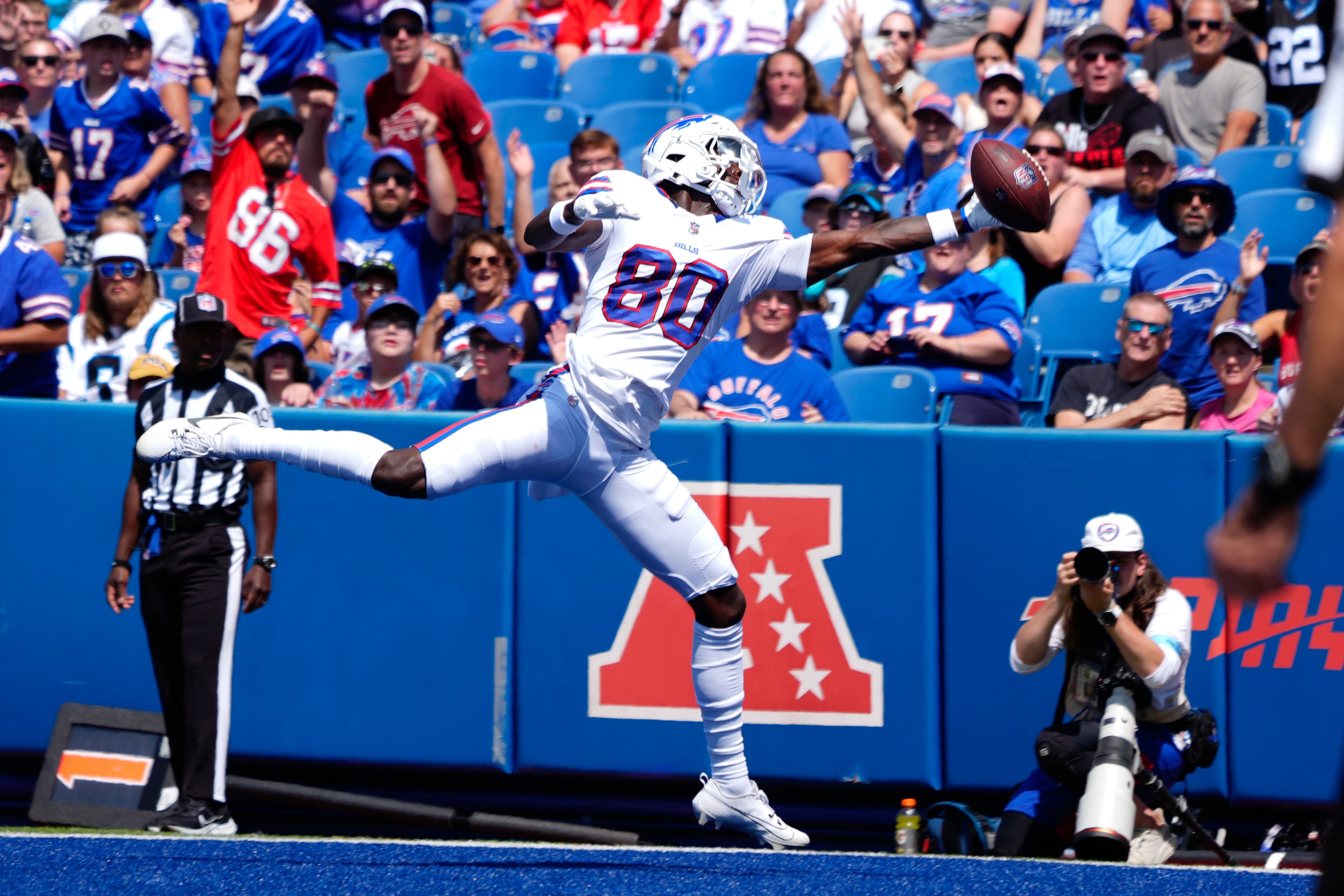 Aug 24, 2024; Orchard Park, New York, USA; Buffalo Bills wide receiver Tyrell Shavers (80) attempts to catch a pass for a touchdown against the Carolina Panthers during the first half at Highmark Stadium.