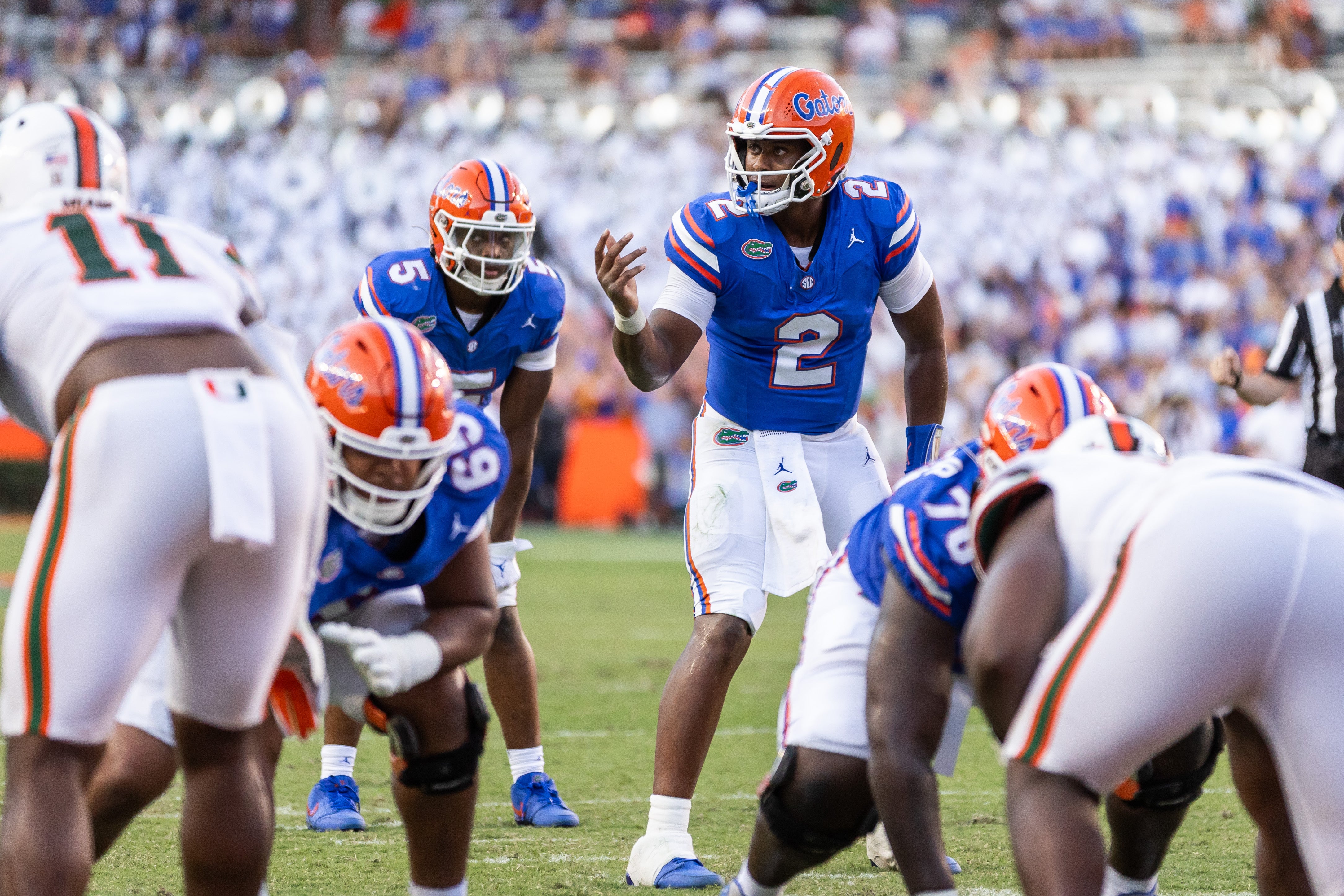 Aug 31, 2024; Gainesville, Florida, USA; Florida Gators quarterback DJ Lagway (2) gestures against the Miami Hurricanes during the second half at Ben Hill Griffin Stadium.