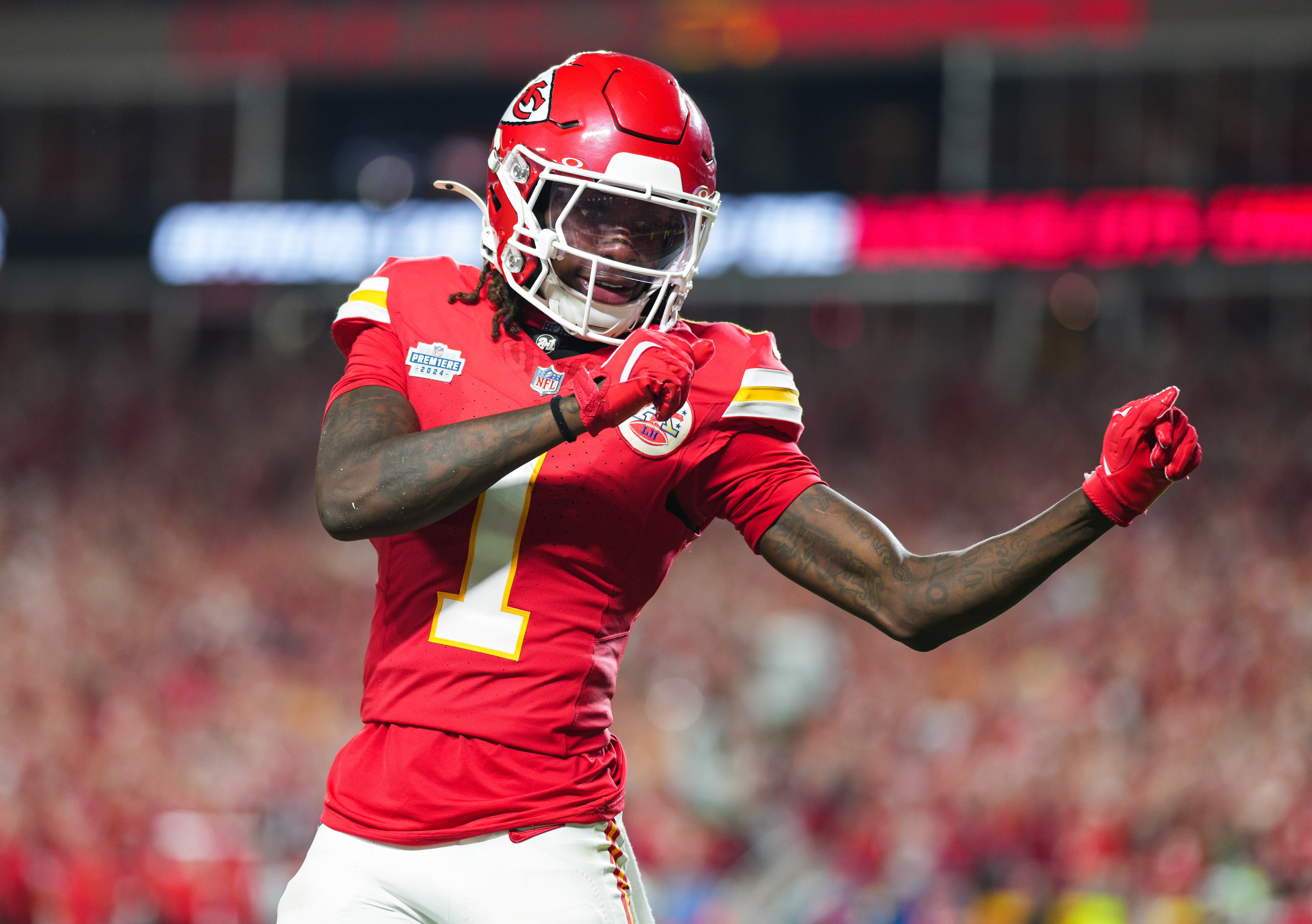 Kansas City Chiefs wide receiver Xavier Worthy (1) celebrates after scoring a touchdown during the second half against the Baltimore Ravens