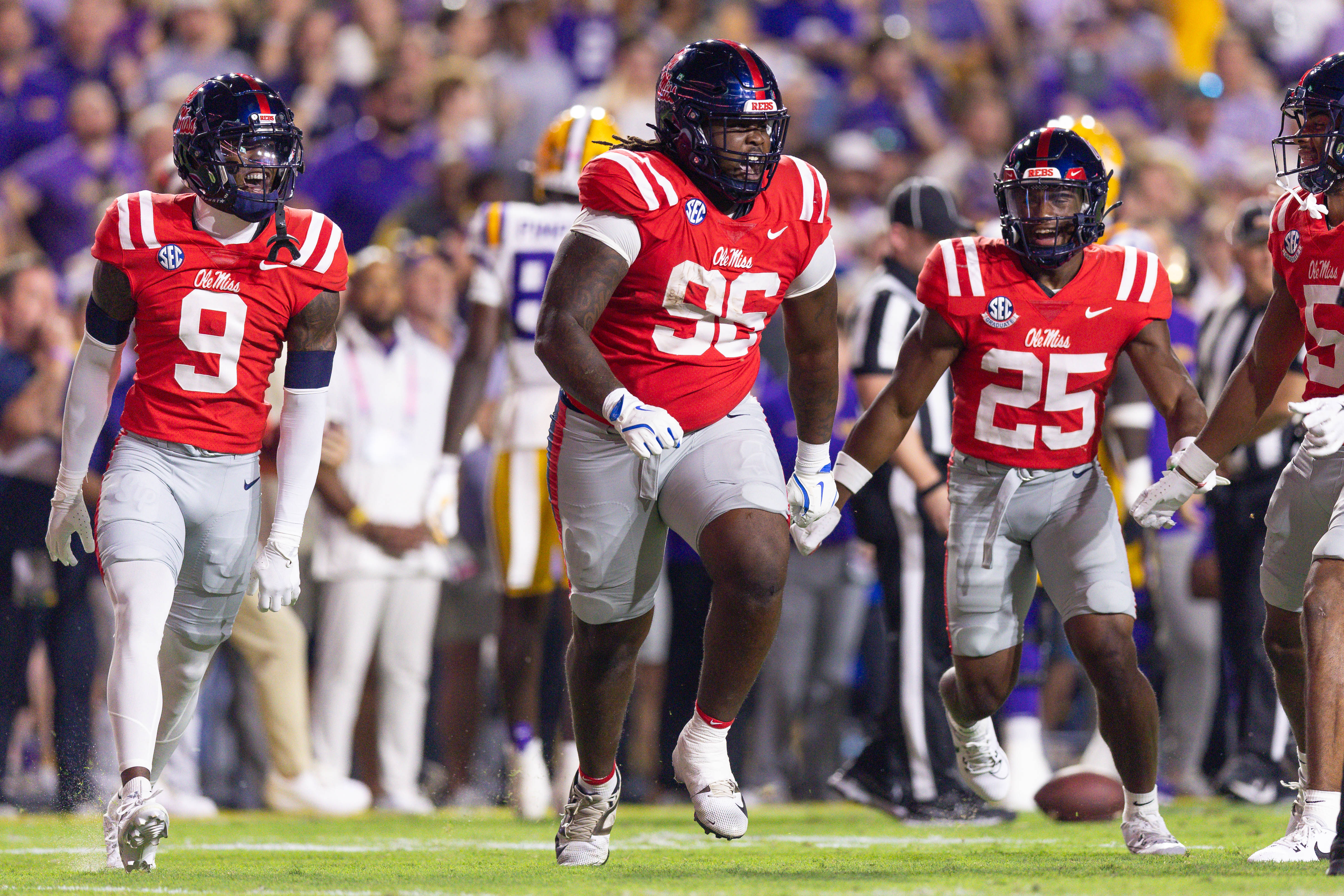 Oct 12, 2024; Baton Rouge, Louisiana, USA; Mississippi Rebels defensive tackle Jamarious Brown (96) reacts after intercepting a pass against the LSU Tigers during the first half at Tiger Stadium.