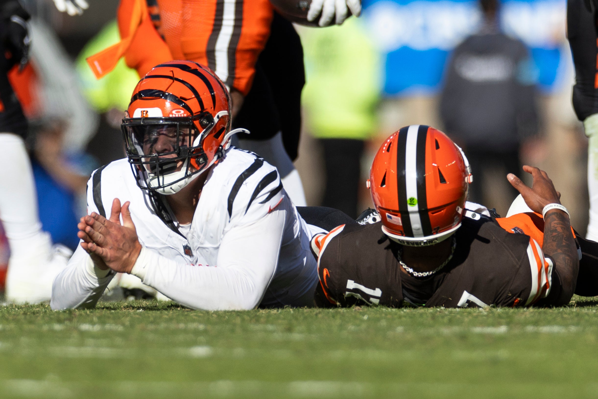Oct 20, 2024; Cleveland, Ohio, USA; Cincinnati Bengals defensive end Trey Hendrickson (91) looks up after tackling Cleveland Browns quarterback Dorian Thompson-Robinson (17) during the fourth quarter at Huntington Bank Field.
