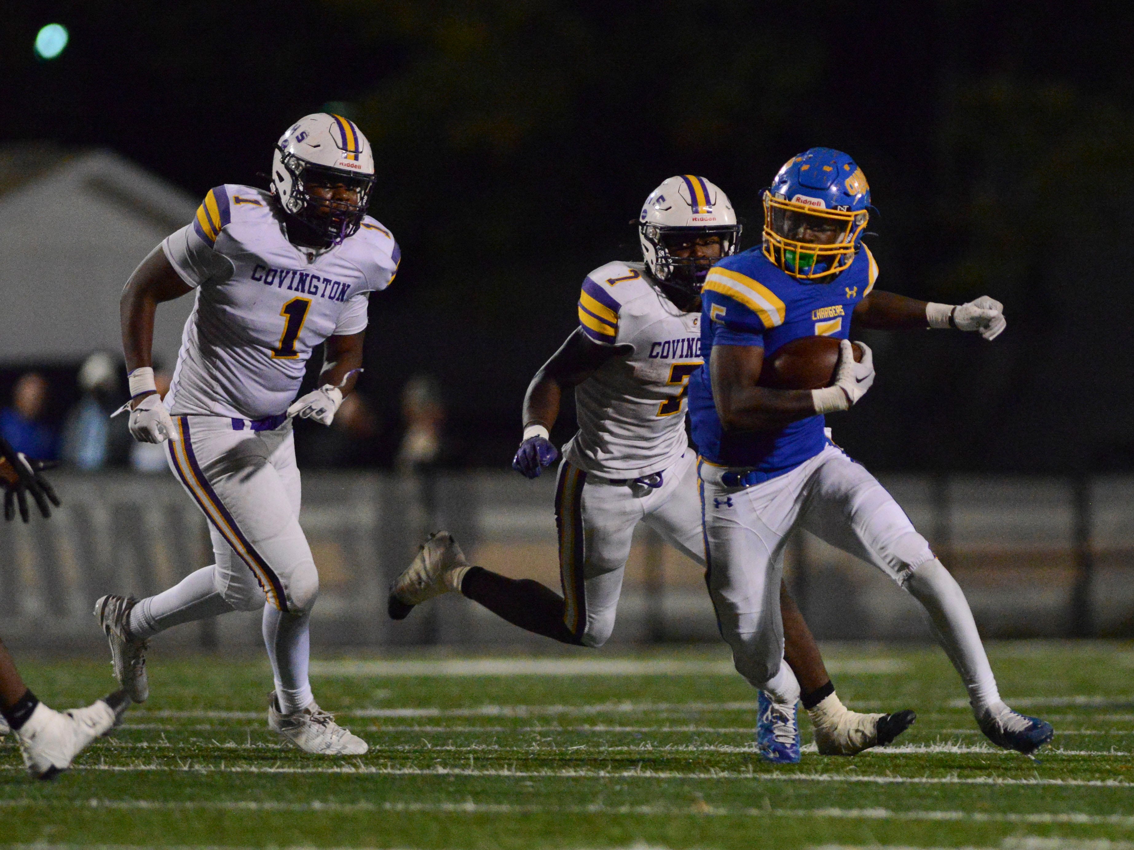 Westview's Asa Barnes (5) tries to outrun Covington defenders during a TSSAA Football match between Westview vs Covington inside Hardy G. Graham Stadium, Martin, Tenn., on Friday, Nov. 1, 2024.
