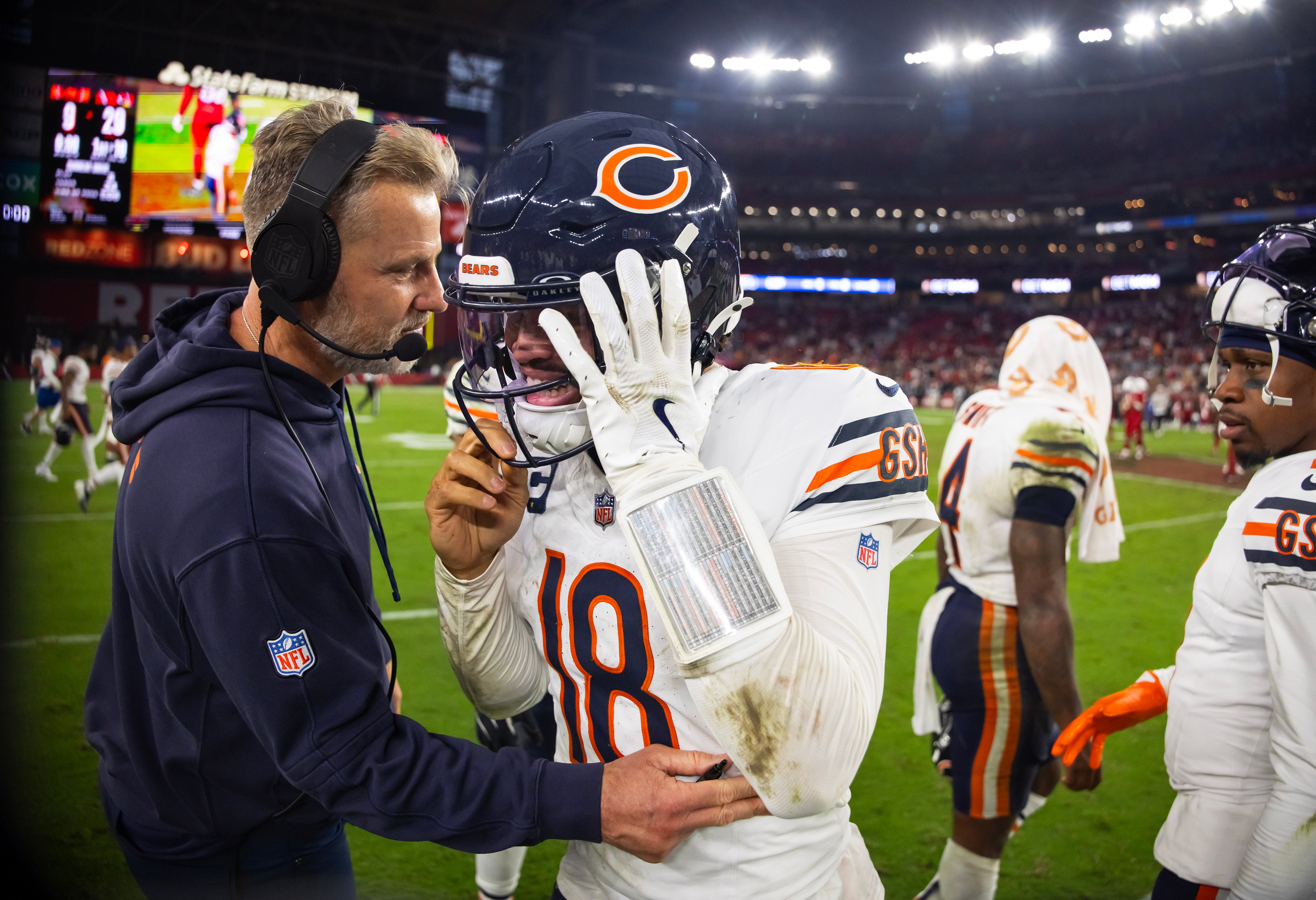 Nov 3, 2024; Glendale, Arizona, USA; Chicago Bears quarterback Caleb Williams (18) reacts with head coach Matt Eberflus following the game against the Arizona Cardinals at State Farm Stadium.