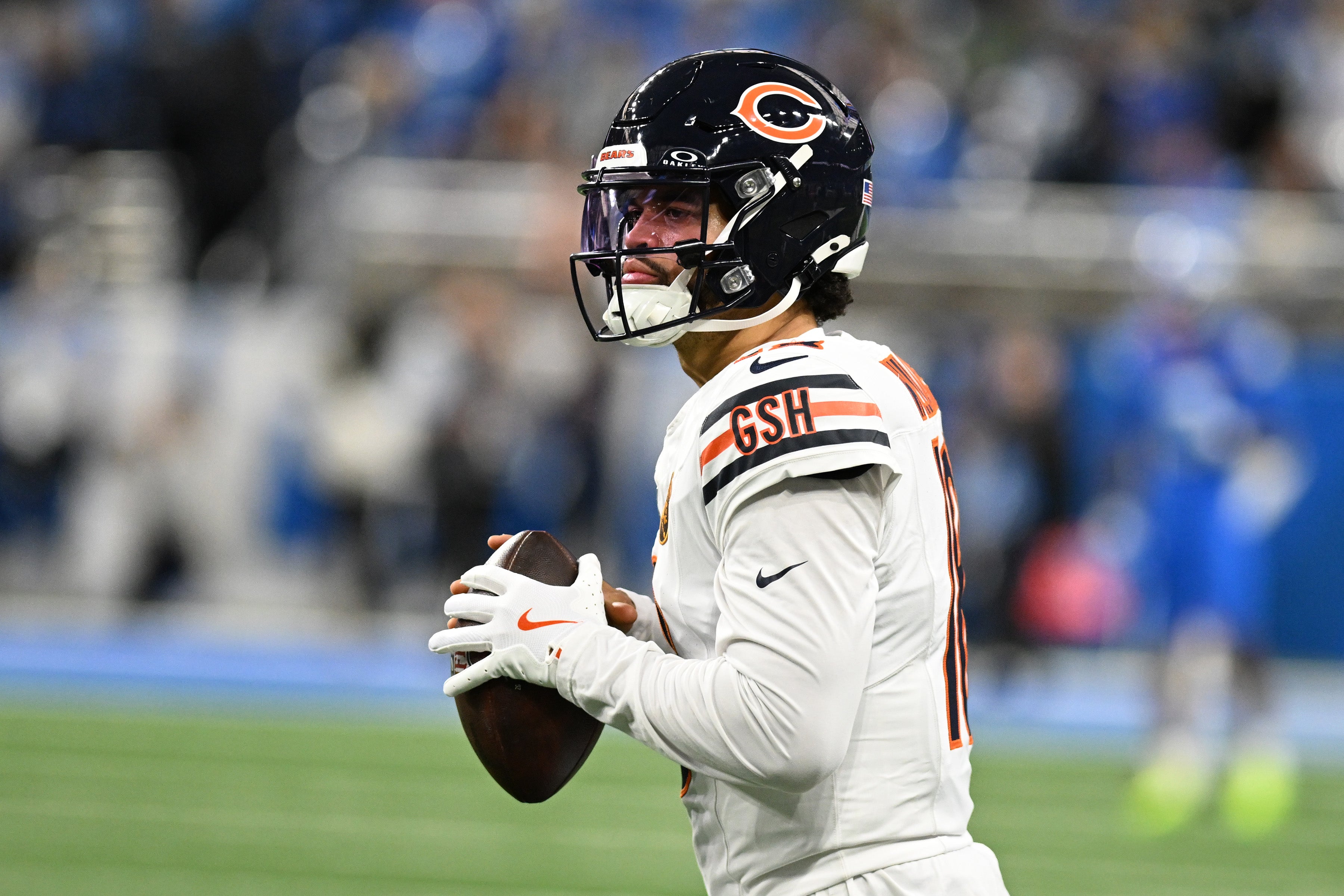 Nov 28, 2024; Detroit, Michigan, USA; Chicago Bears quarterback Caleb Williams (18) throws passes during pregame warmups before their game against the Detroit Lions at Ford Field.